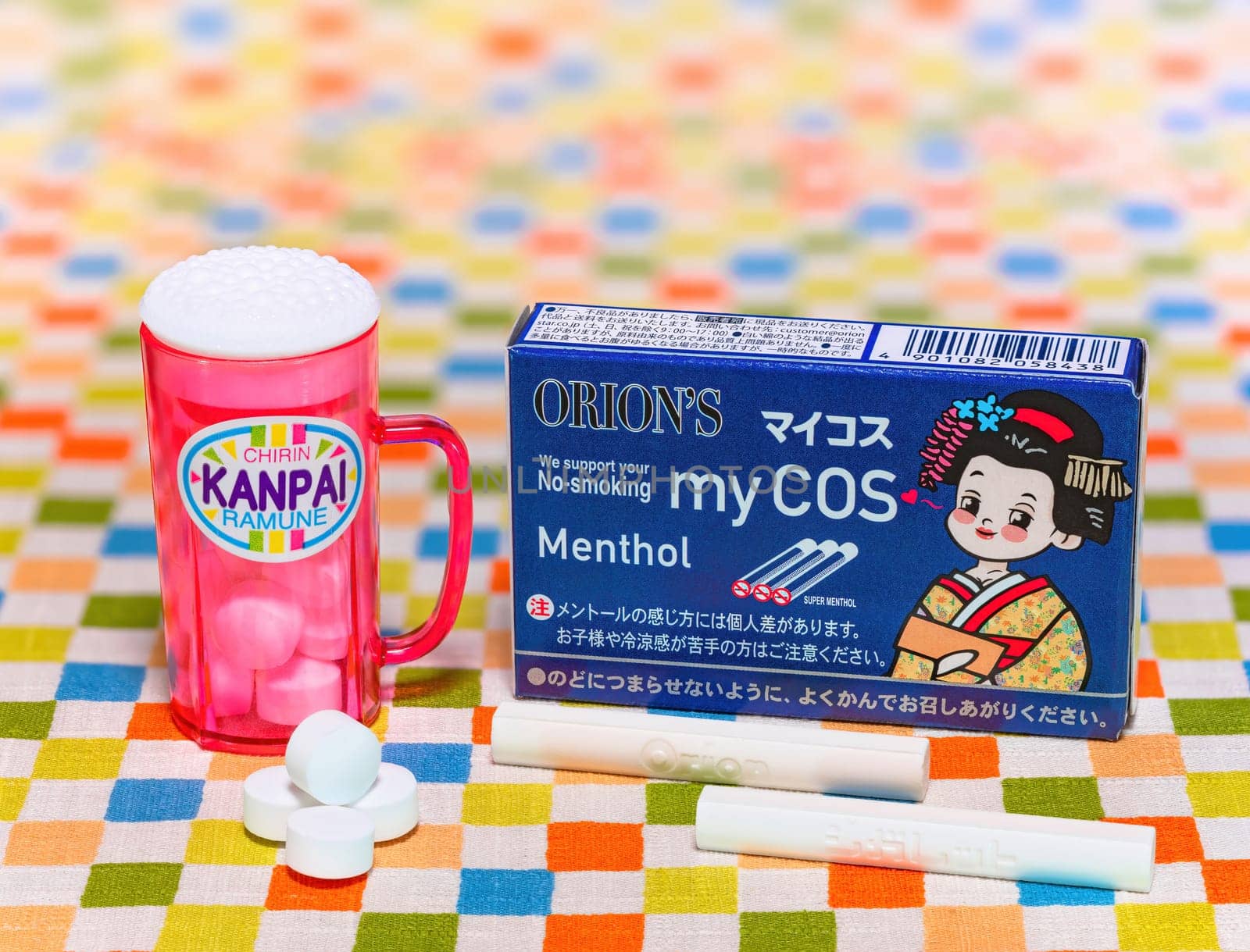 Japanese dagashi penny candies depicting a pack of cocoa cigarettes and a mug of beer. by kuremo