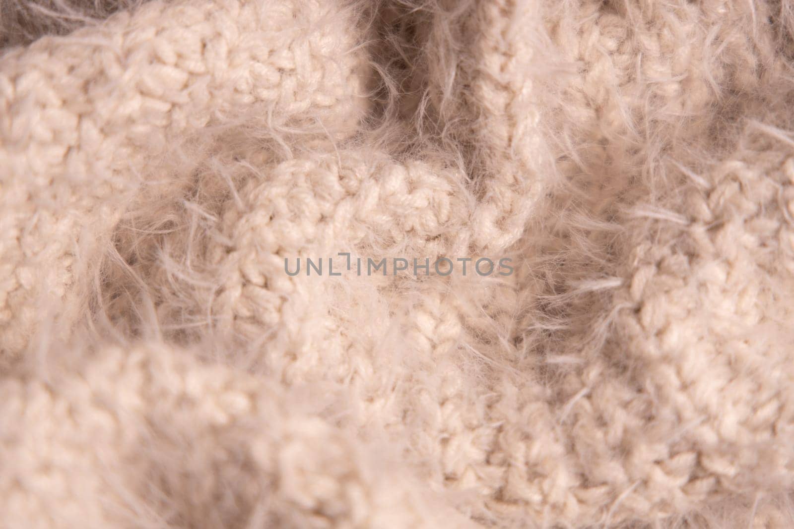 White knitwear texture. Soft texture of homemade cashmere wool sweater. by Ri6ka