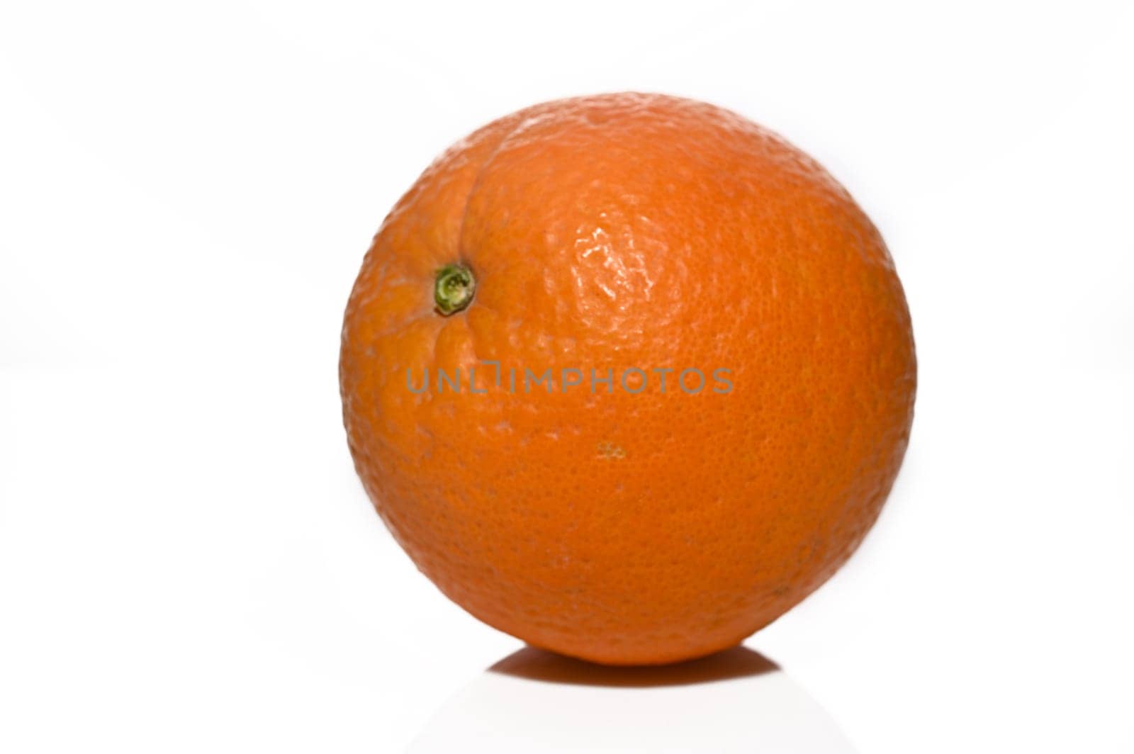One orange isolated on white background close up. Orange Clipping Path. Orange macro studio photo