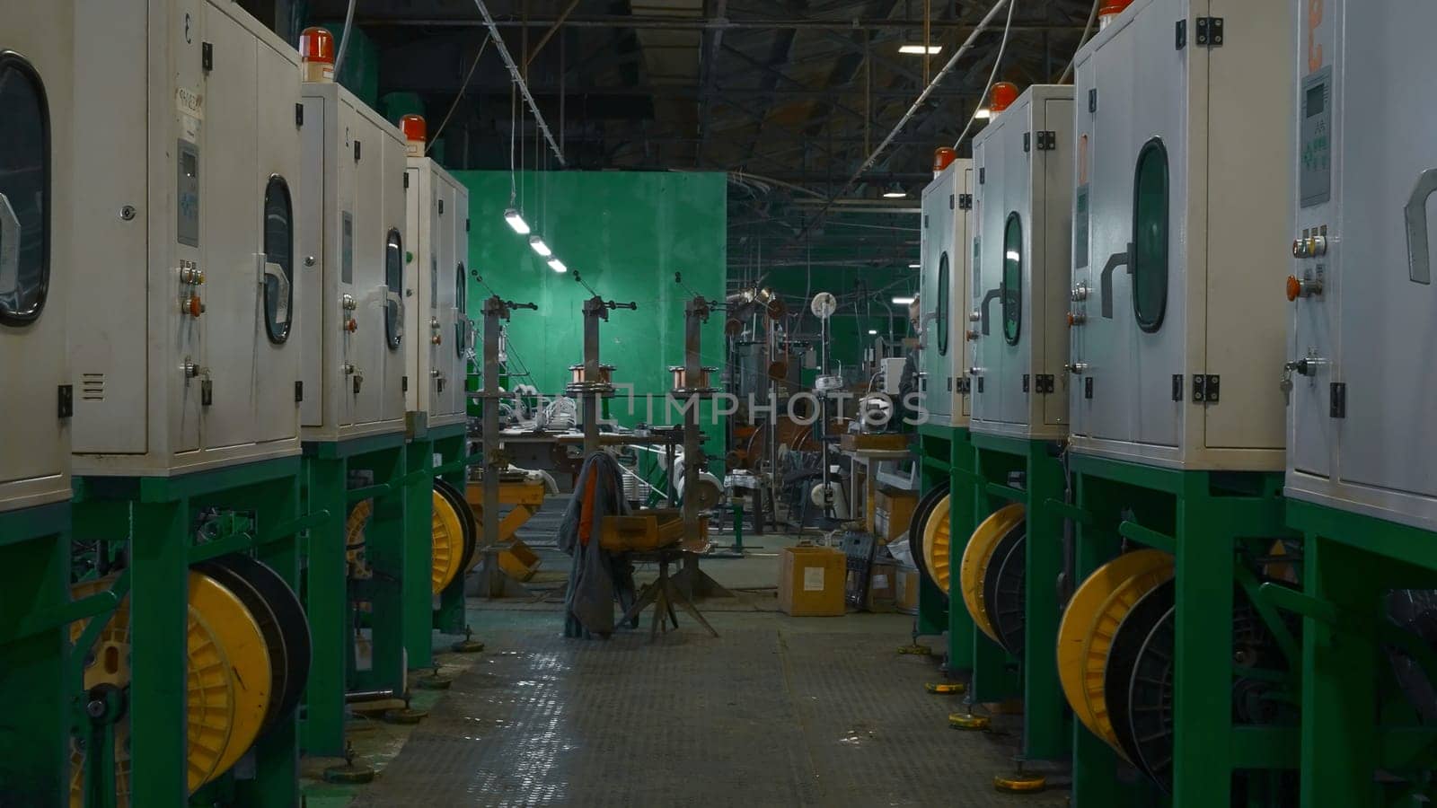 Chemical workshop of metallurgical production. Creative. Rows of production furnaces for melting plastic pellets. Production process of polymer plastic extrusion.