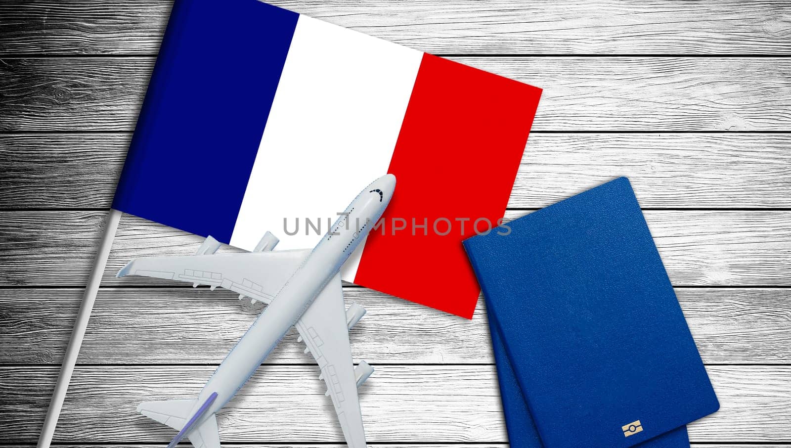 Illustration of a passenger plane flying over the flag of France. Concept of tourism and travel. High quality photo