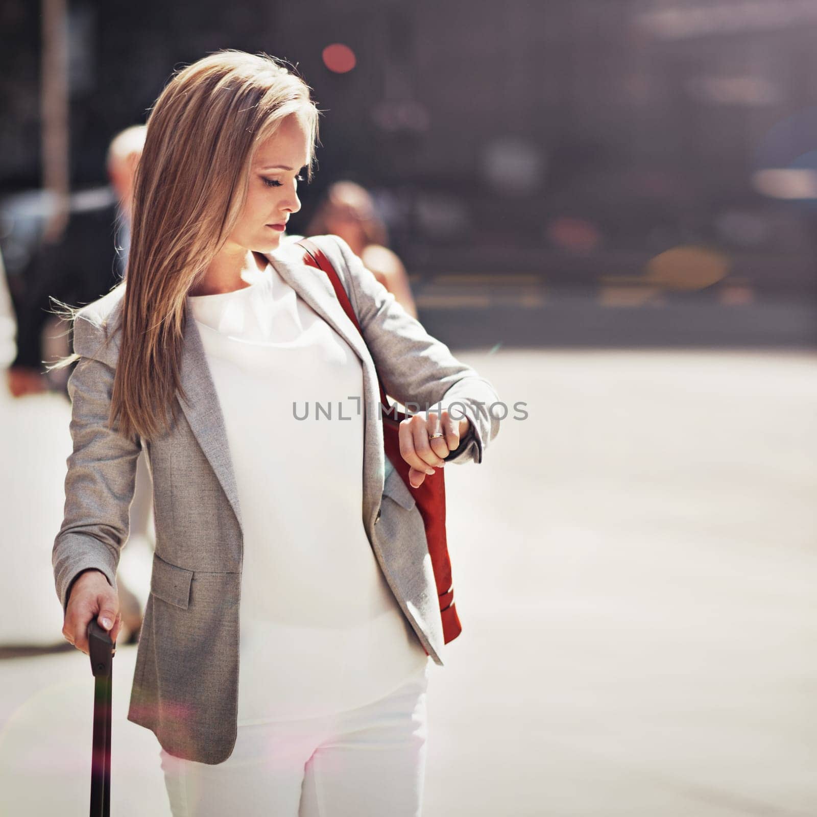 Business, woman and suitcase with watch for travel time management for airplane trip, downtown or city street. Female person, luggage and corporate professional for urban commute, hotel or meeting.