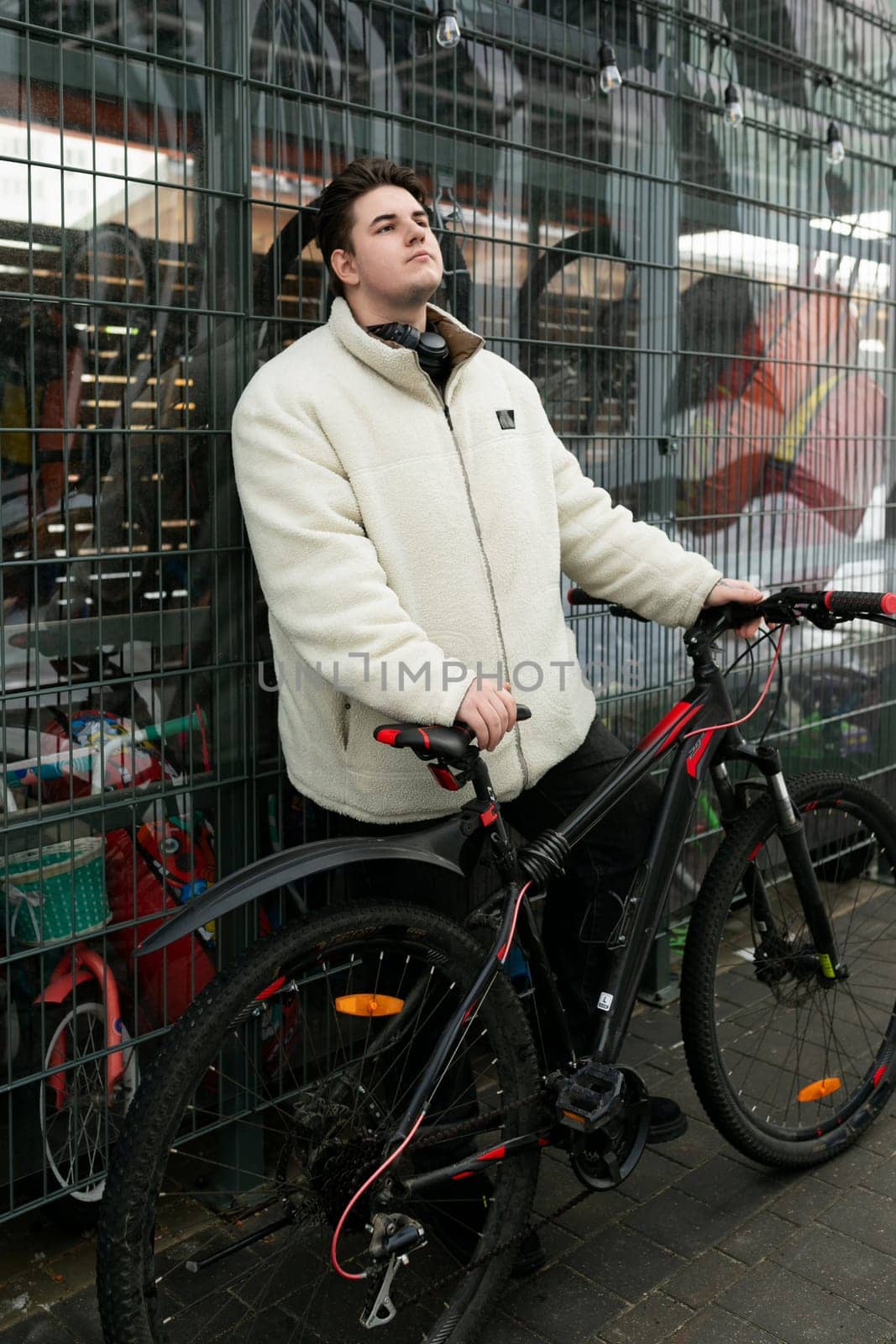 Sports concept, young man spends weekend riding a bike.