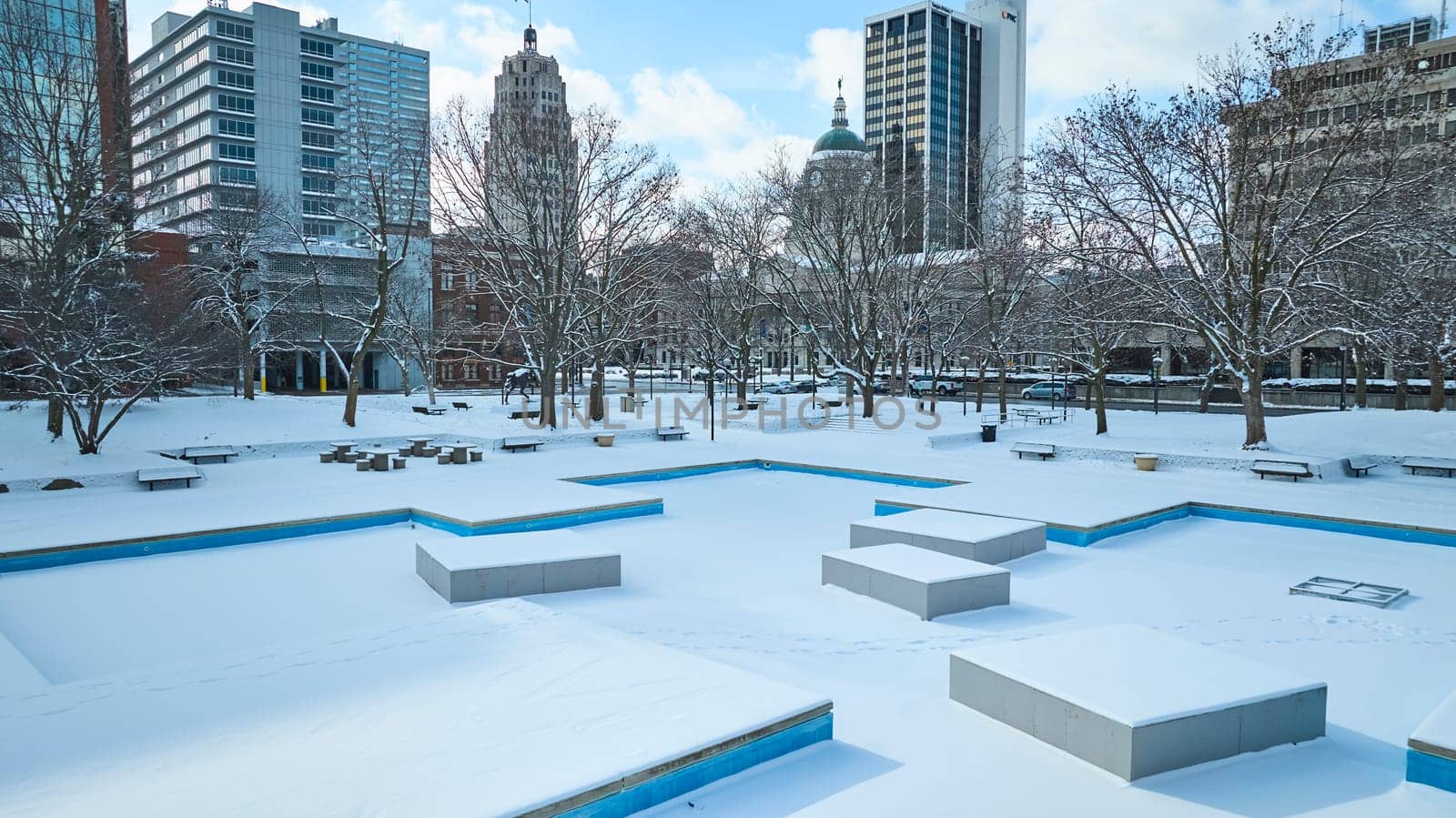 Winter's Tranquil Embrace on Urban Downtown Fort Wayne, Indiana - Snow-kissed Freimann Square Amidst Historic and Modern Architecture