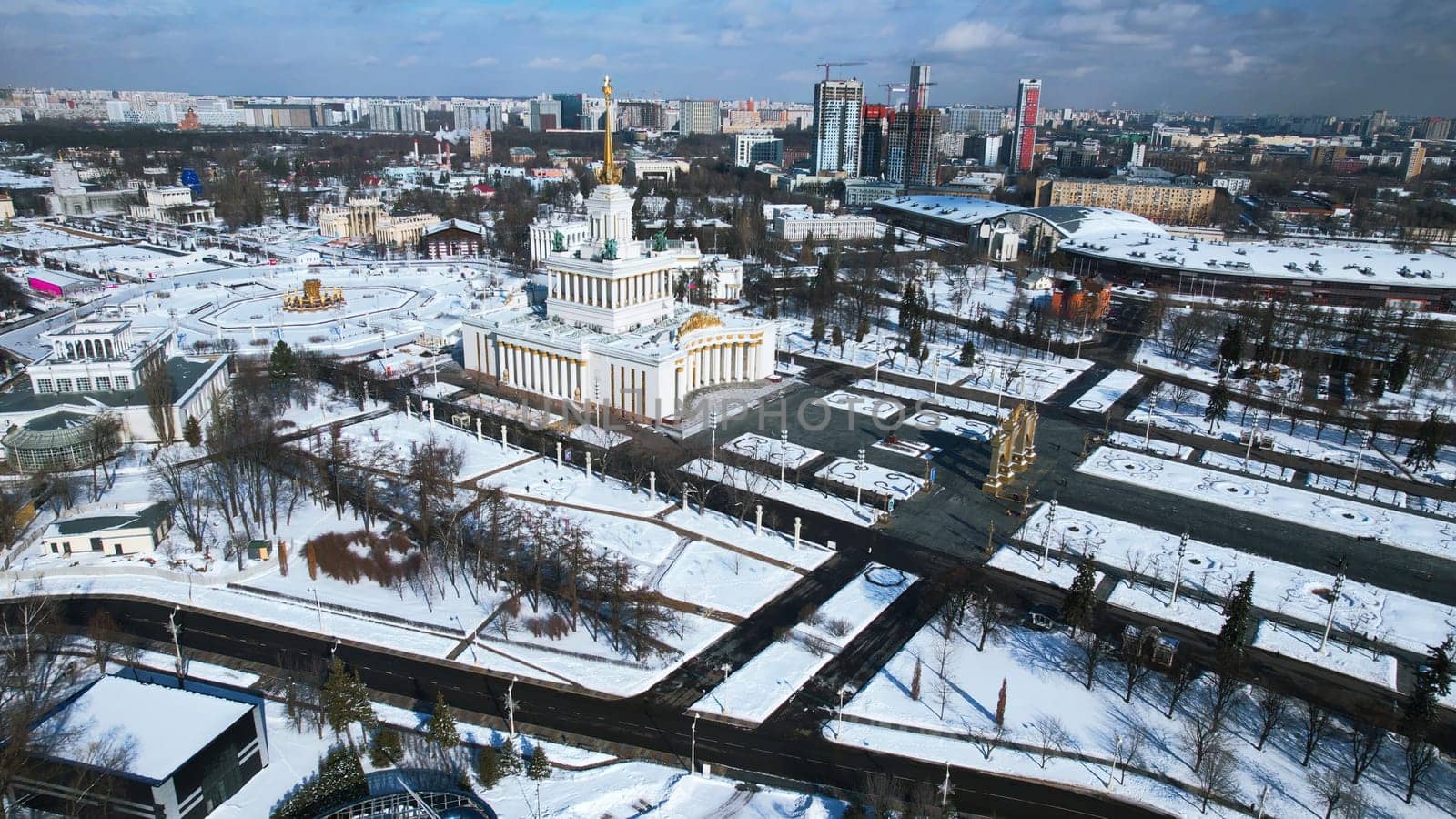 Top view of square with historical building in winter. Creative. center of the Soviet city with square and historical building. Beautiful urban landscape with historical center and square in winter.
