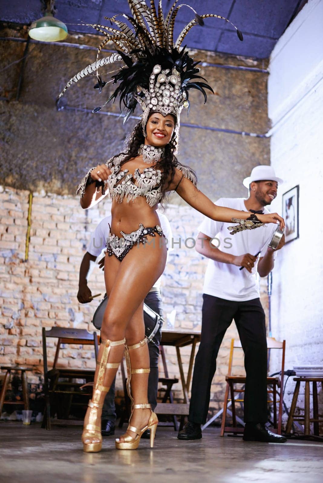 Women, happy and samba dancer for performance with smile or talent, fashion and drums for music in Brazil. Female person, costume and band at event or show for entertainment, celebration and heritage.