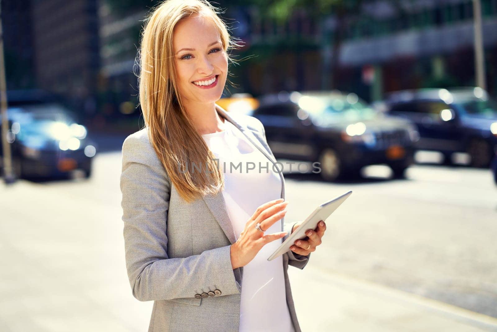 Smile, tablet and portrait of businesswoman, urban or city for corporate employee. Confidence, technology or commute or travel to workplace in New York, business consultant of female entrepreneur by YuriArcurs