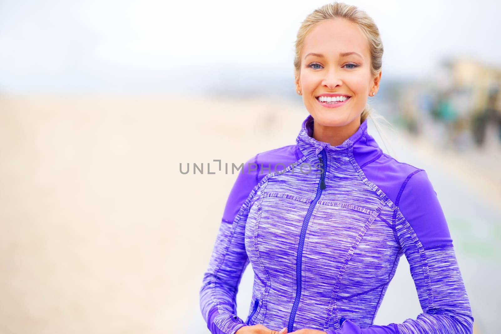 Woman, runner and ready in portrait by beach, exercise and training for marathon in sportswear. Female person, outdoors and fitness for healthy body, jog and cardio challenge for active workout.