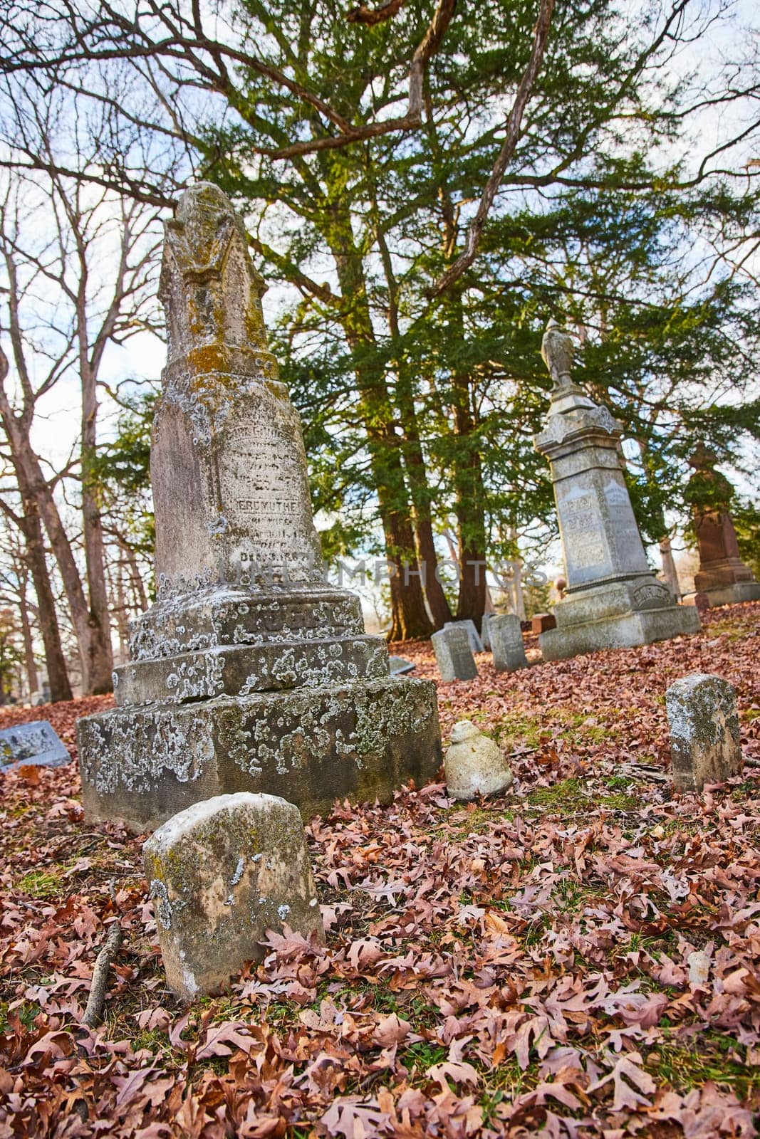 Autumnal Tranquility at Historic Lindenwood Cemetery, Fort Wayne - Weathered Tombstones Blanketed by Fall Leaves