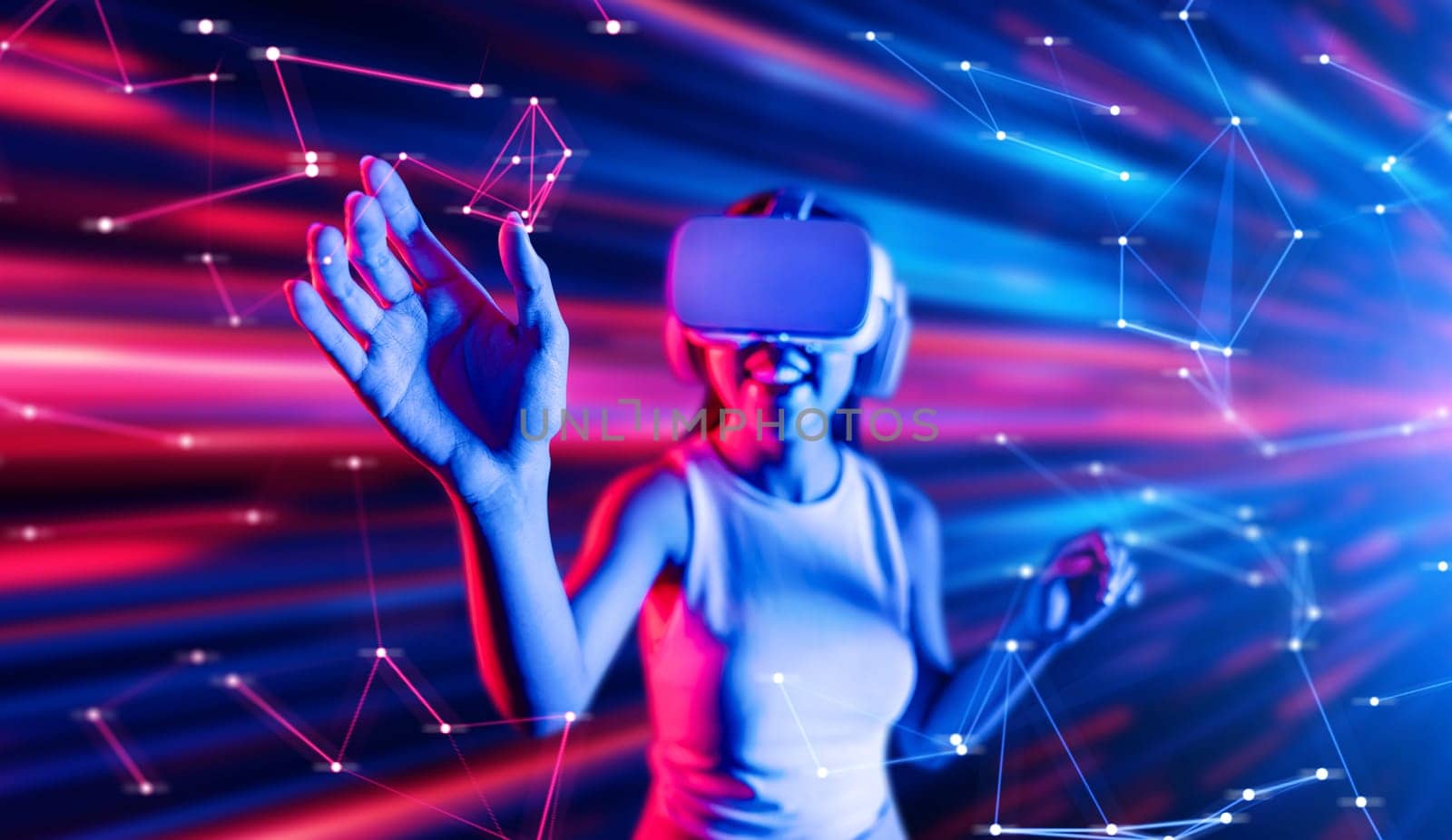 Smart female standing in cyberpunk style building in meta wear VR headset connecting metaverse, future cyberspace community technology, Woman use finger touching virtual reality object. Hallucination.