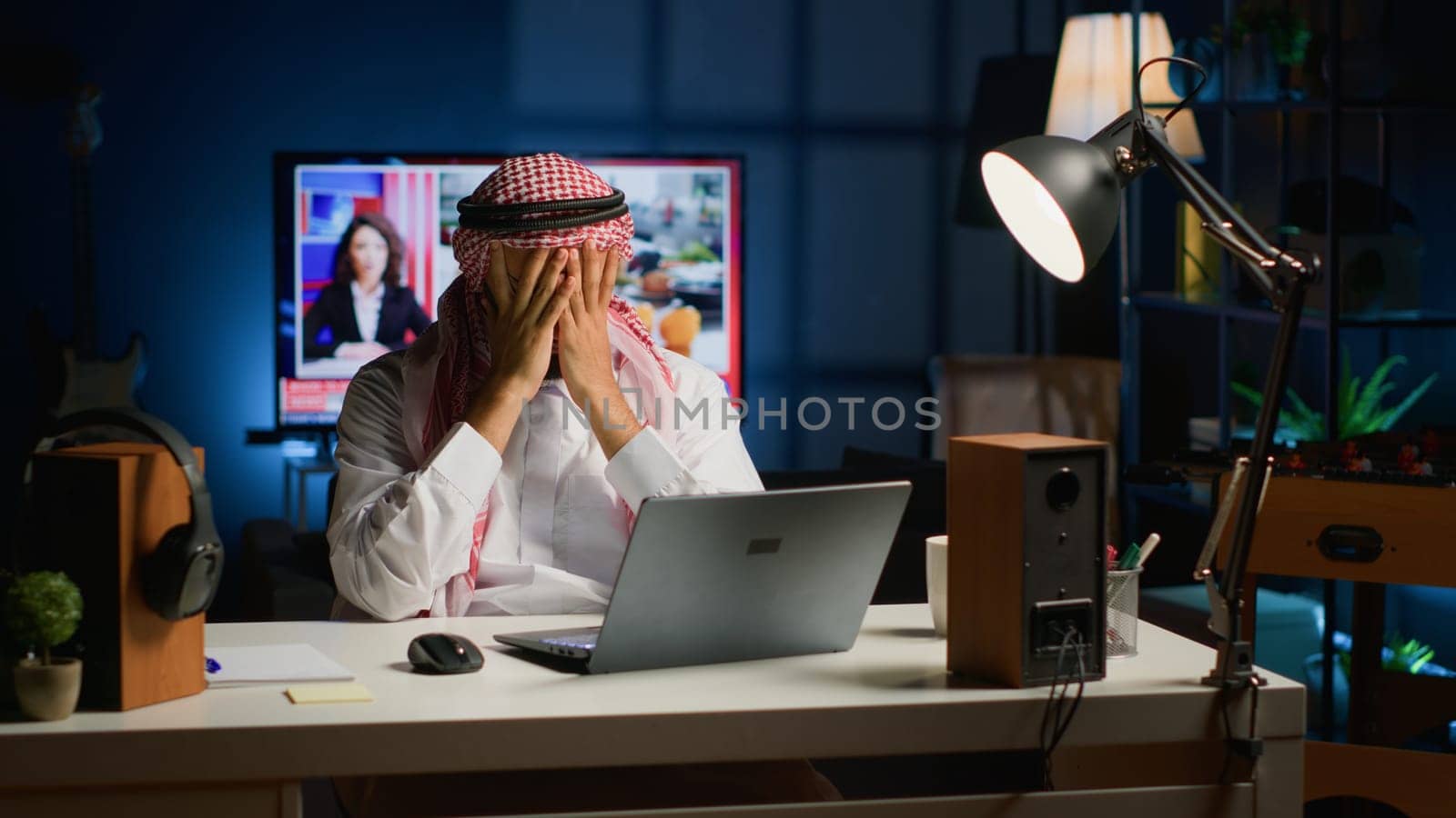 Businessman suffers headache during work by DCStudio