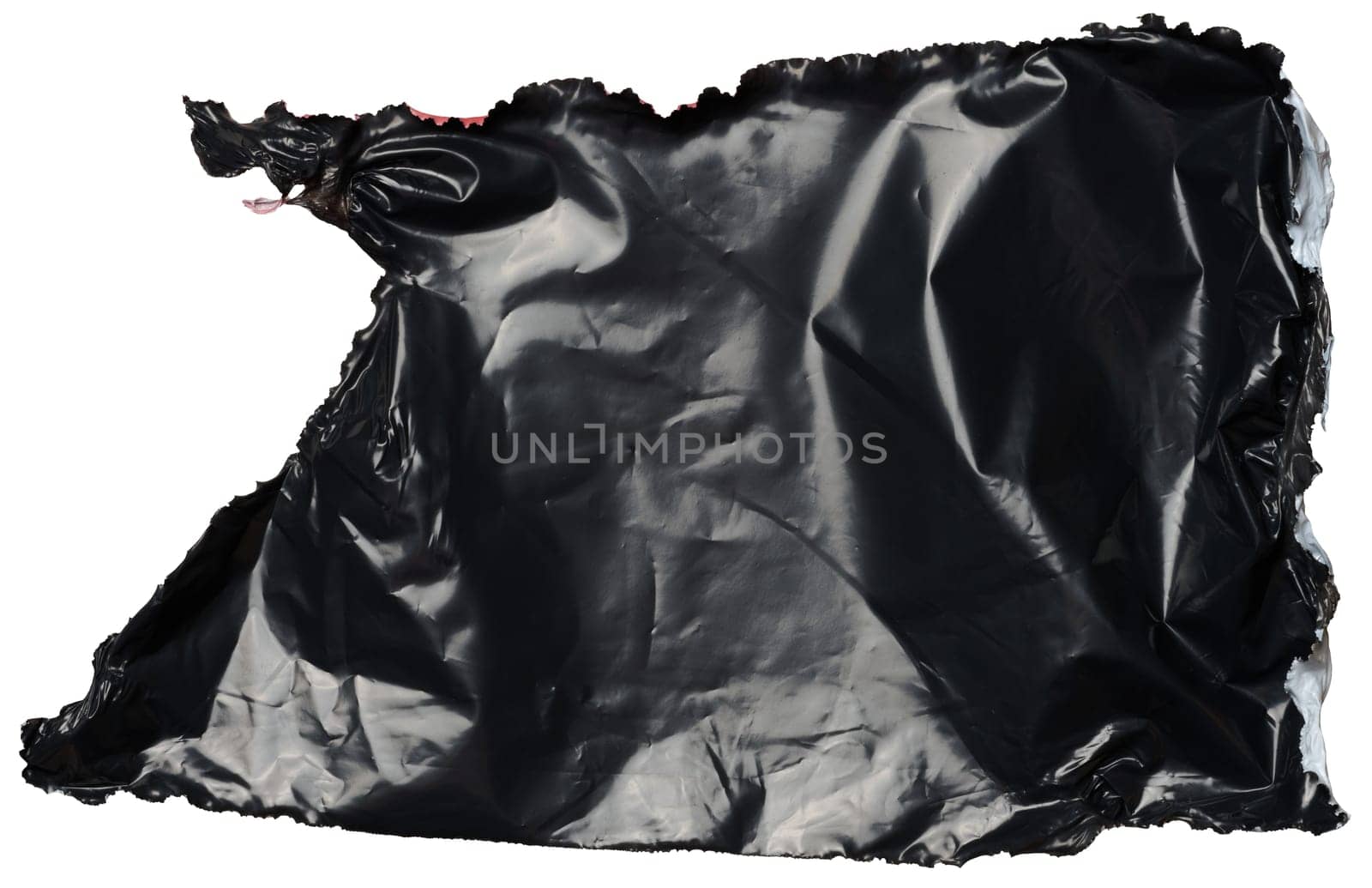 Torn piece of black polyethylene on isolated background, close up