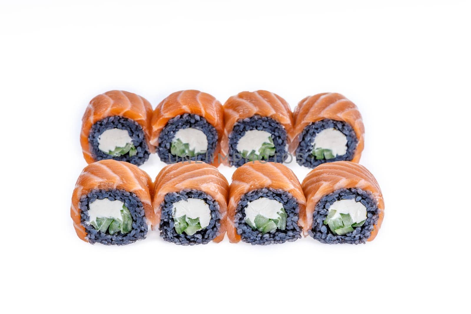 Sushi roll with black rice and salmon isolated