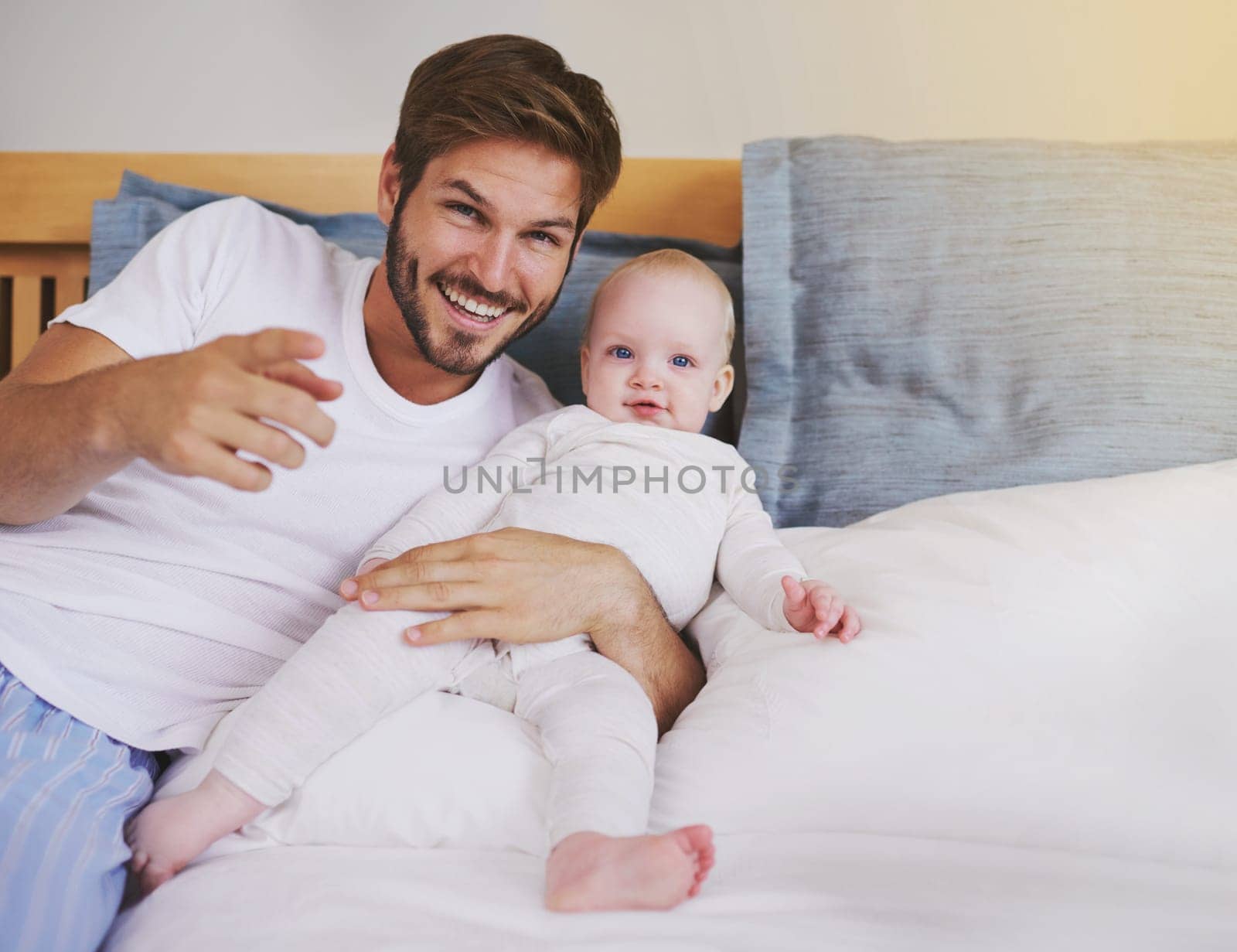 Family, bedroom and portrait of father with baby for bonding, relationship and love for parenting. Happy, home and dad relax with newborn infant for child development, support and care in house by YuriArcurs