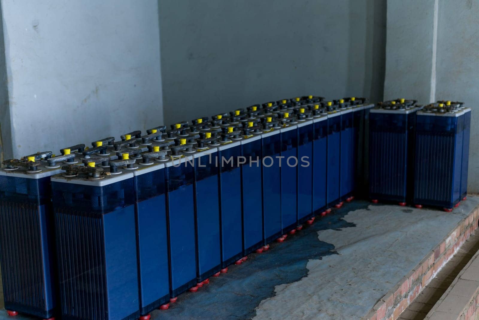 Powerful rechargeable battery forklift. On the surface of the battery is an electrical connector. - image