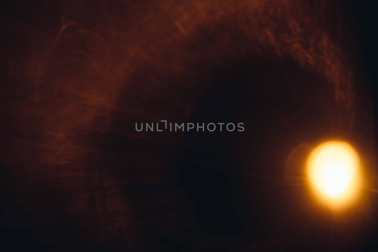 Abstract Natural Sun flare on the black.
