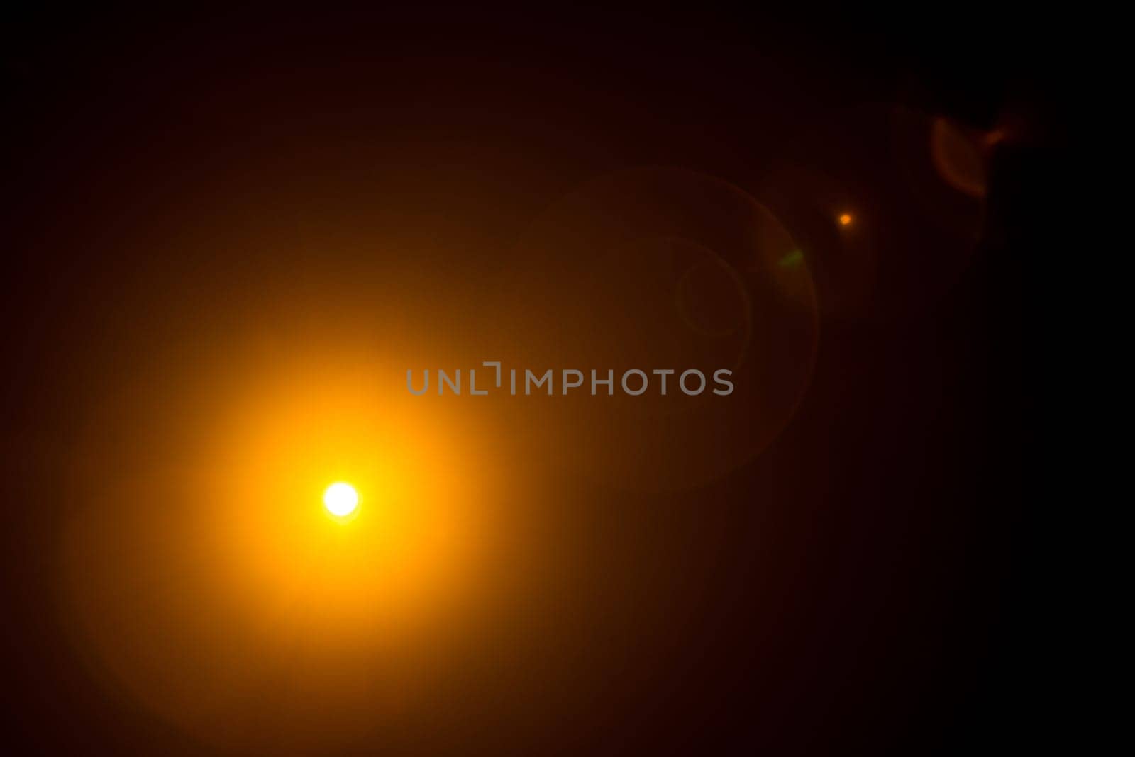 Abstract Natural Sun flare on the black.