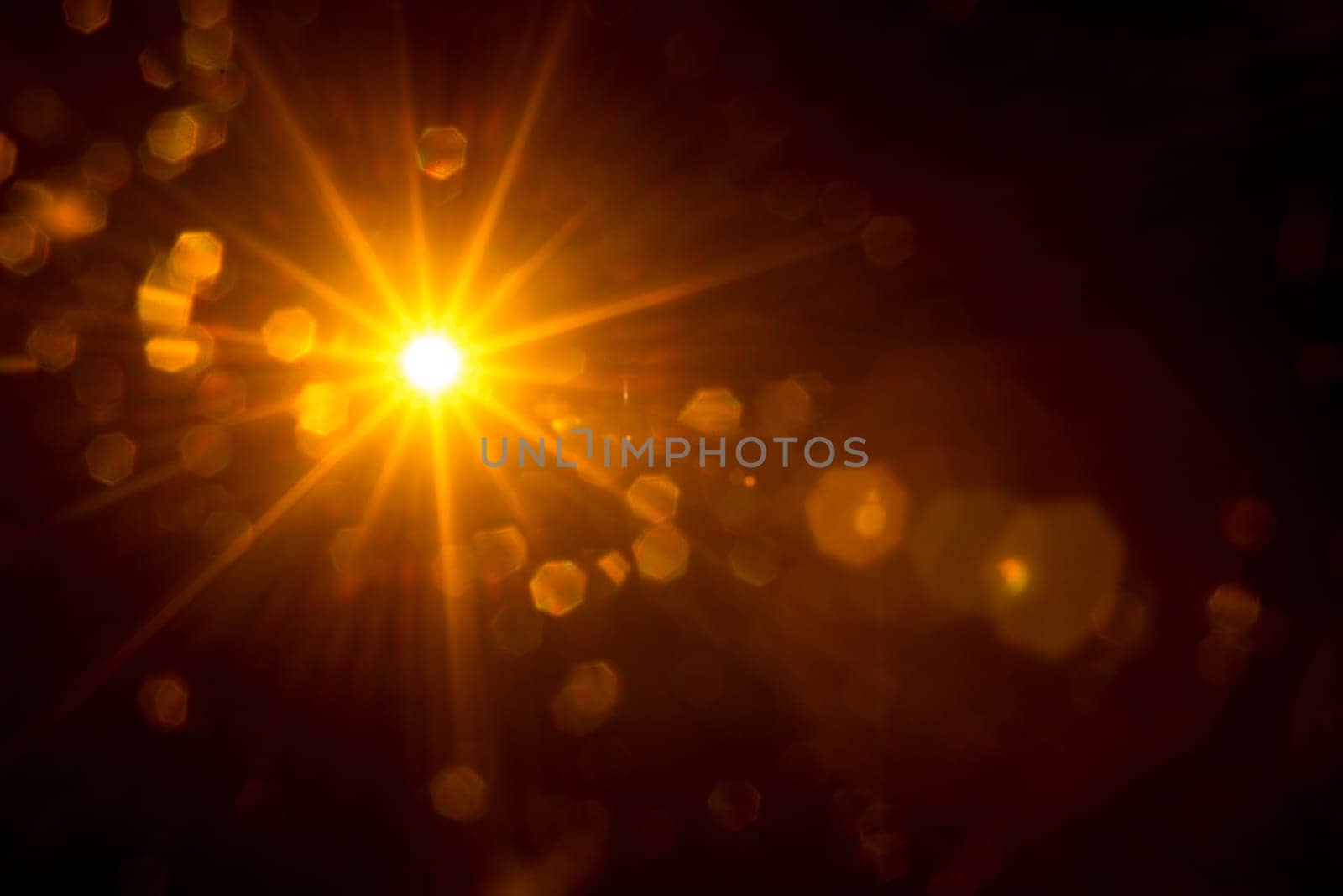 Abstract Natural Sun flare on the black.