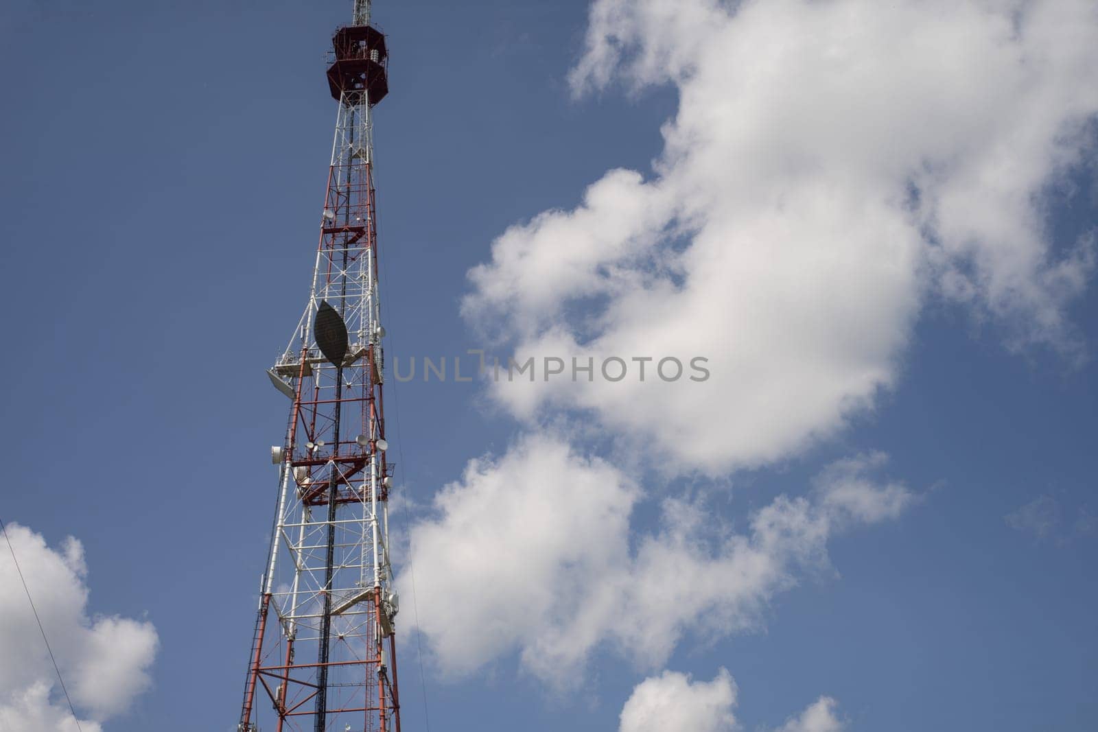 Telecommunication towers include of radio microwave and television antenna system with cloud blue sky .