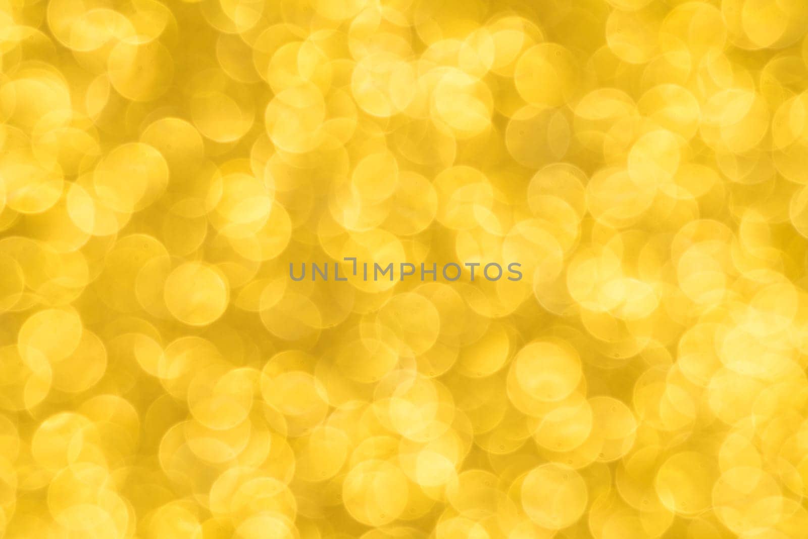 Abstract christmas lights glitter background. christmas gold texture background.
