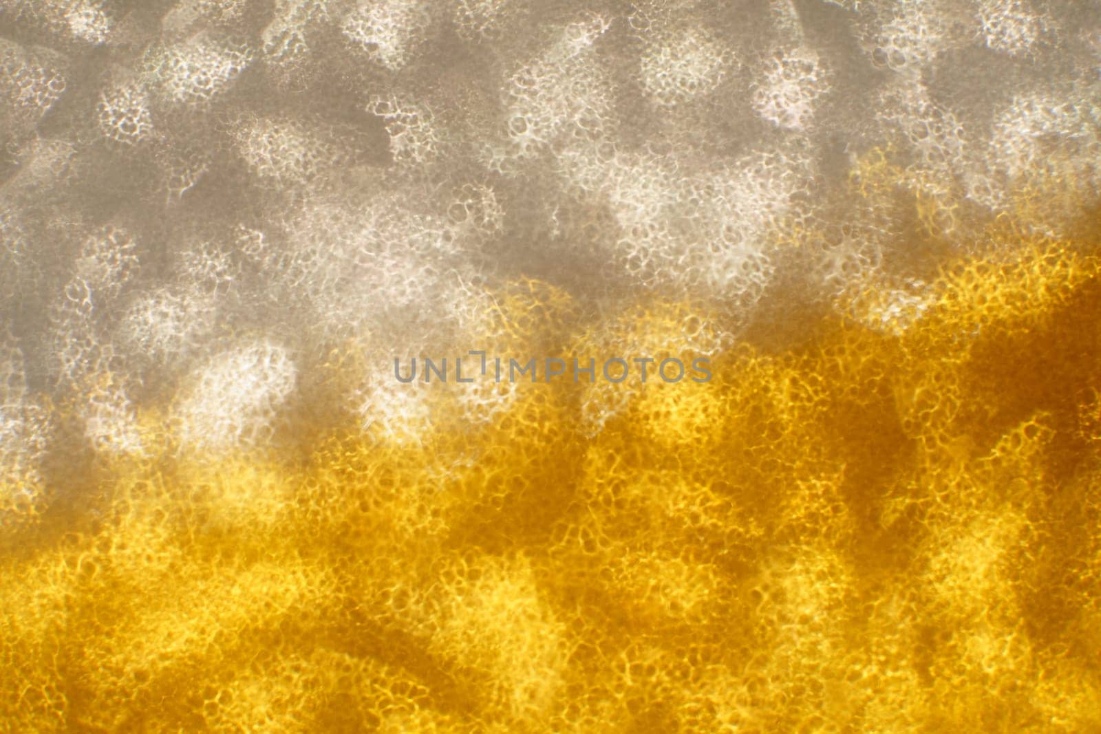 Christmas background. Festive abstract background with bokeh defocused lights and stars.