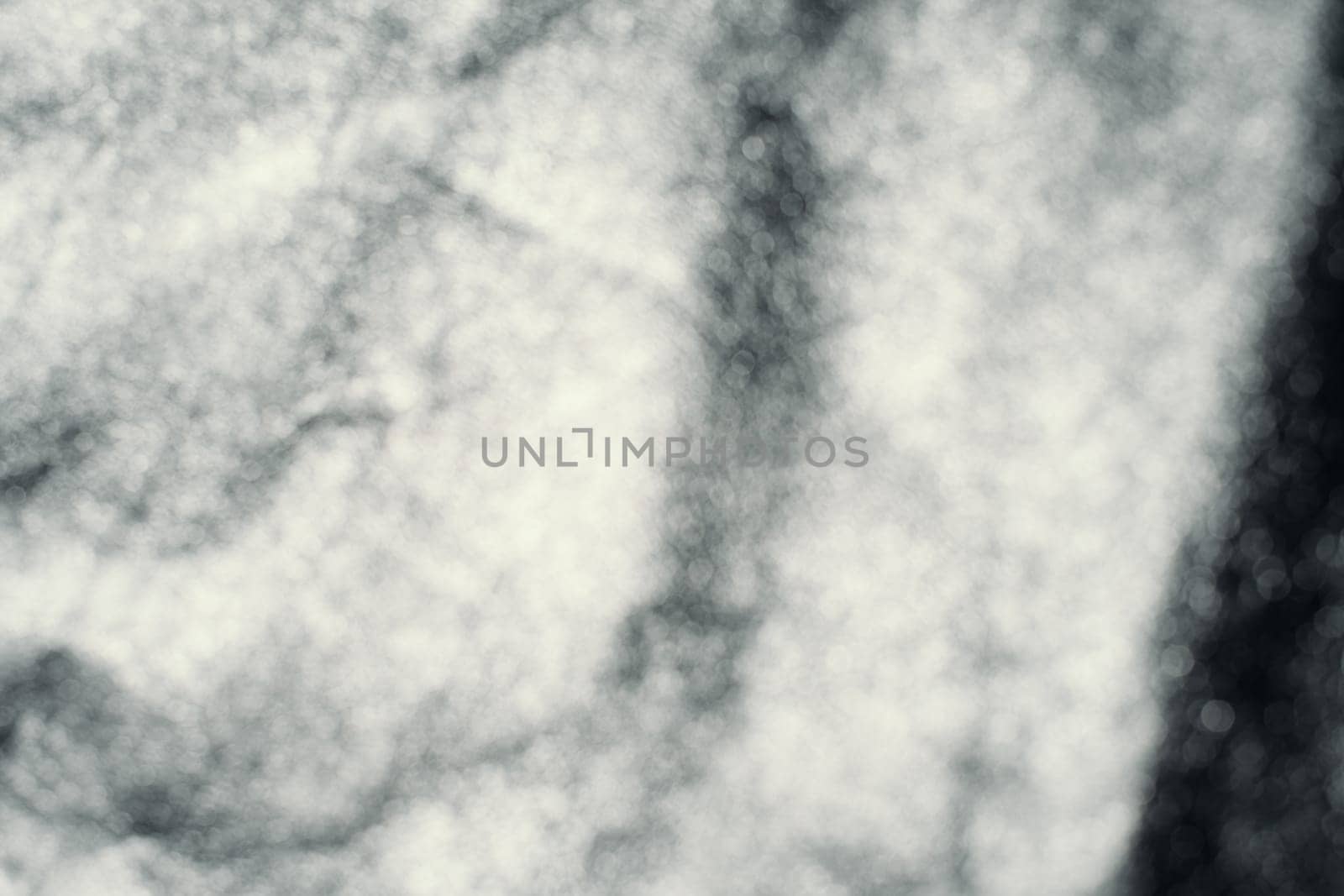 Black leather background with rich texture detail. close-up of black leather. A blurred background.