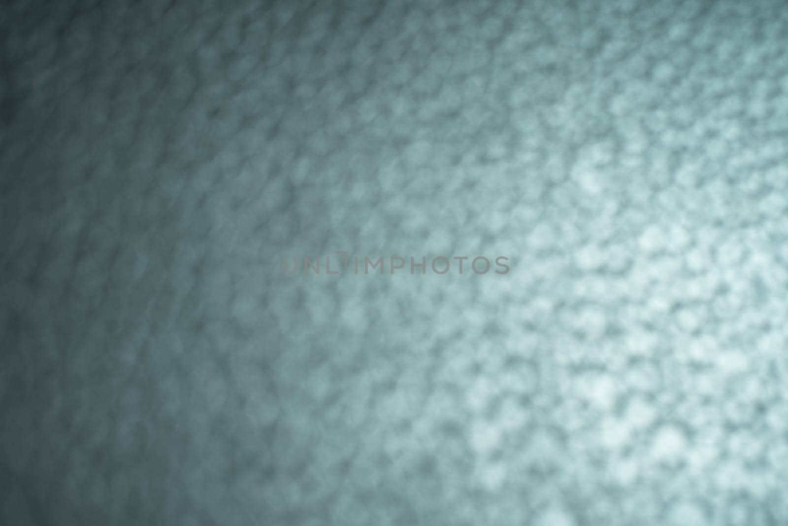 Black leather background with rich texture detail. close-up of black leather. A blurred background.
