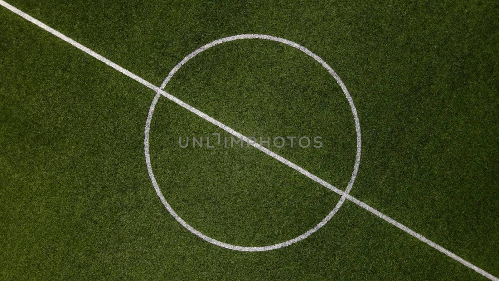 Aerial view of the center of a football field.