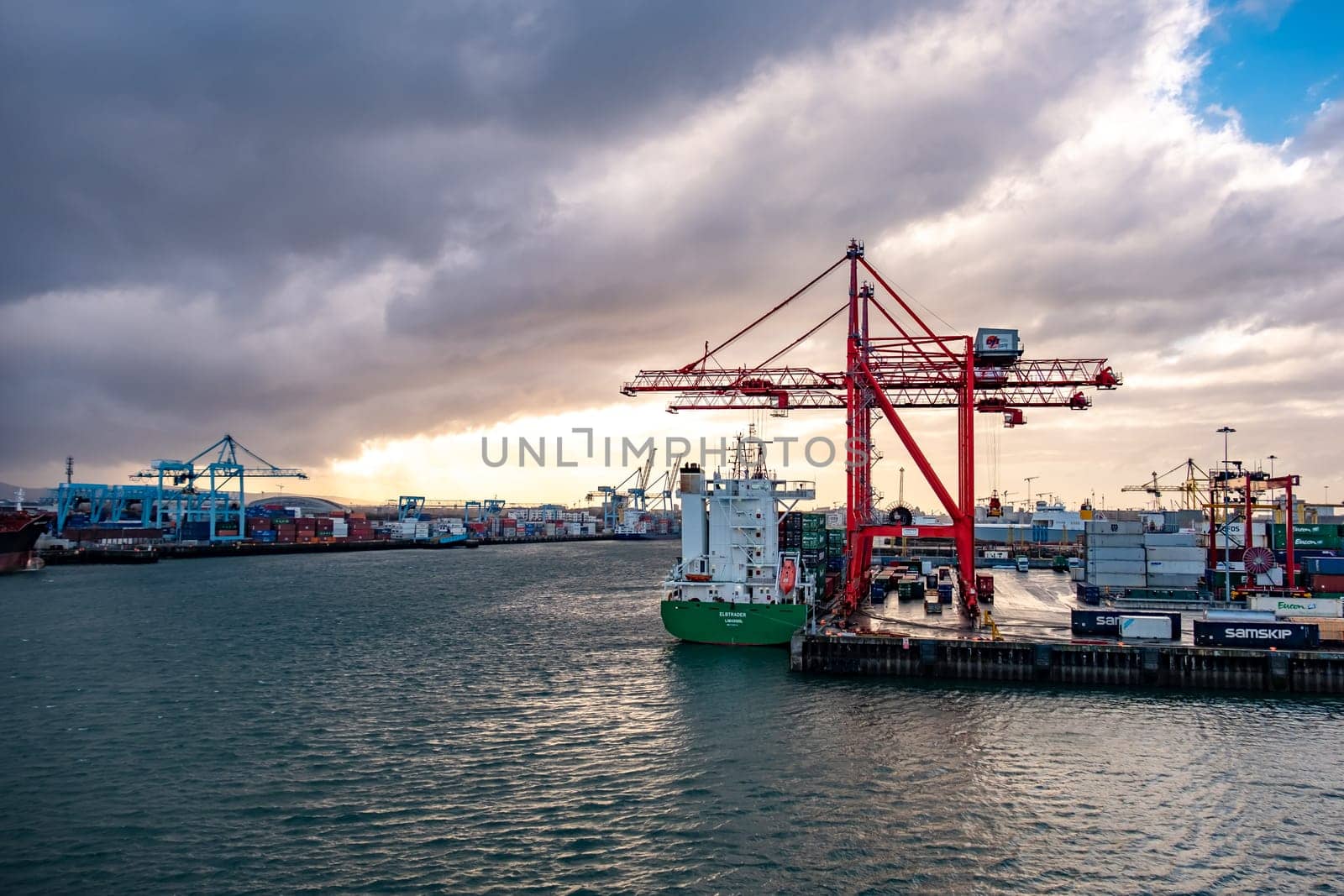 DUBLIN, IRELAND- MARCH 03 2019: Container cranes working at Dublin port.