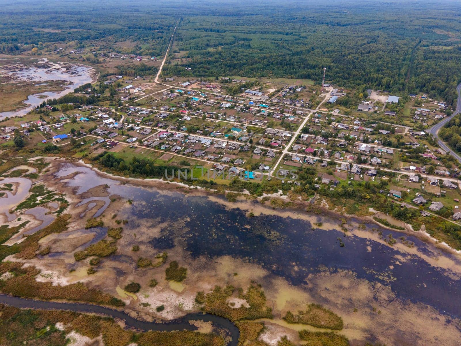 aerial view of suburbia between swamp and forest in Kirov Region of Russia. drone shot