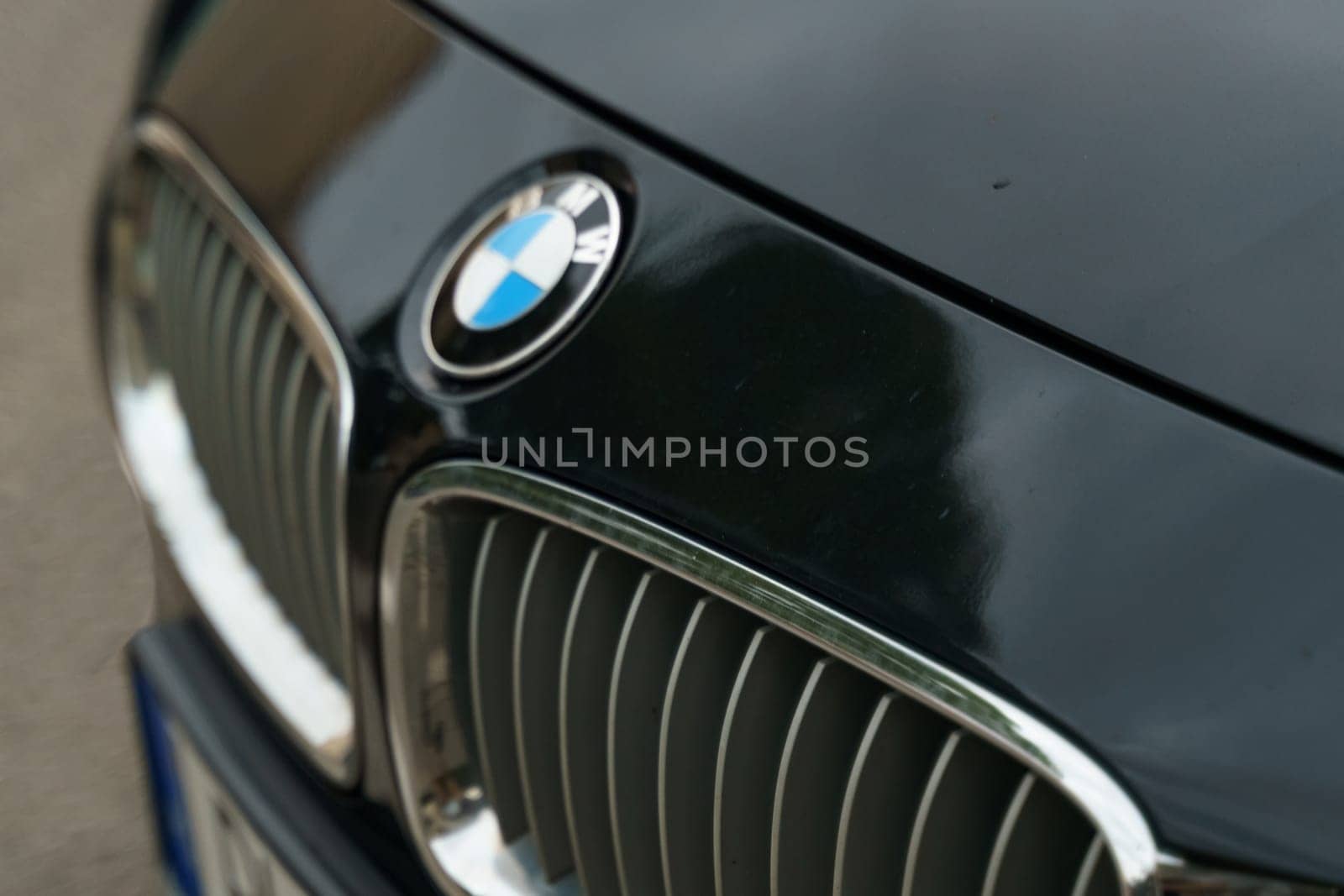 BMW logo on the hood of a black car. by Sd28DimoN_1976