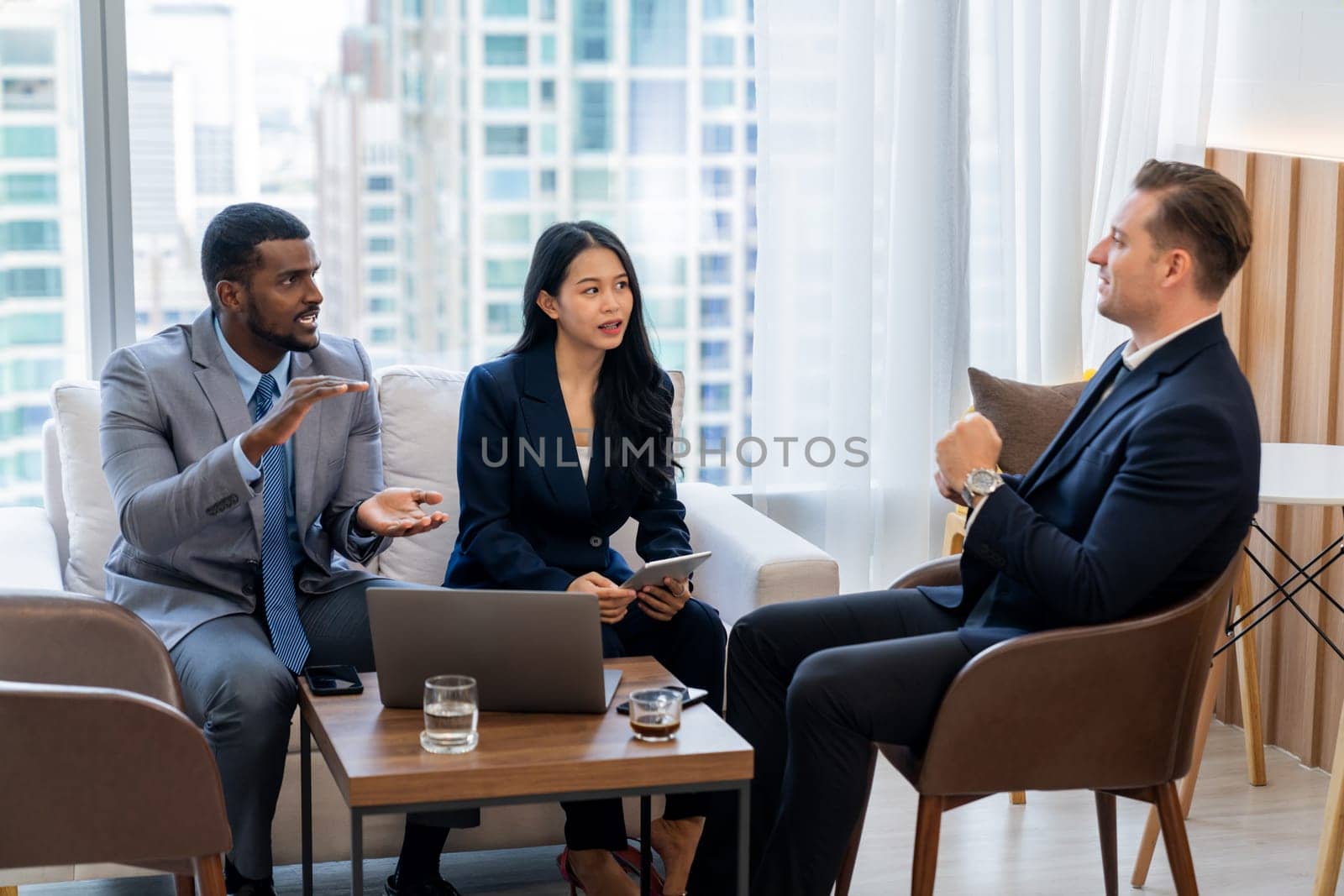 African businessman present start up project to expert investor. Group of multicultural business team solving problems, discussing business idea with skyscraper at modern business lounge. Ornamented