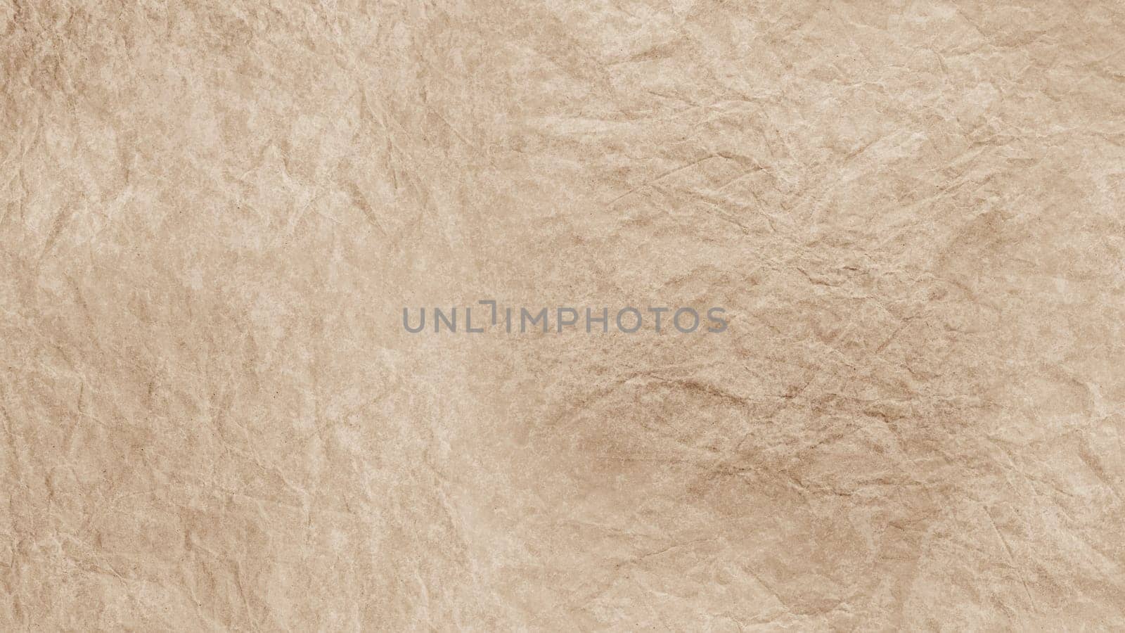 Crumpled paper texture. Abstract background. Light cream color. High quality photo