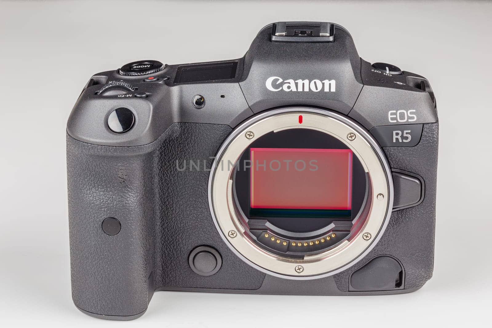 mirrorless digital camera body Canon R5 without lens on white background by z1b
