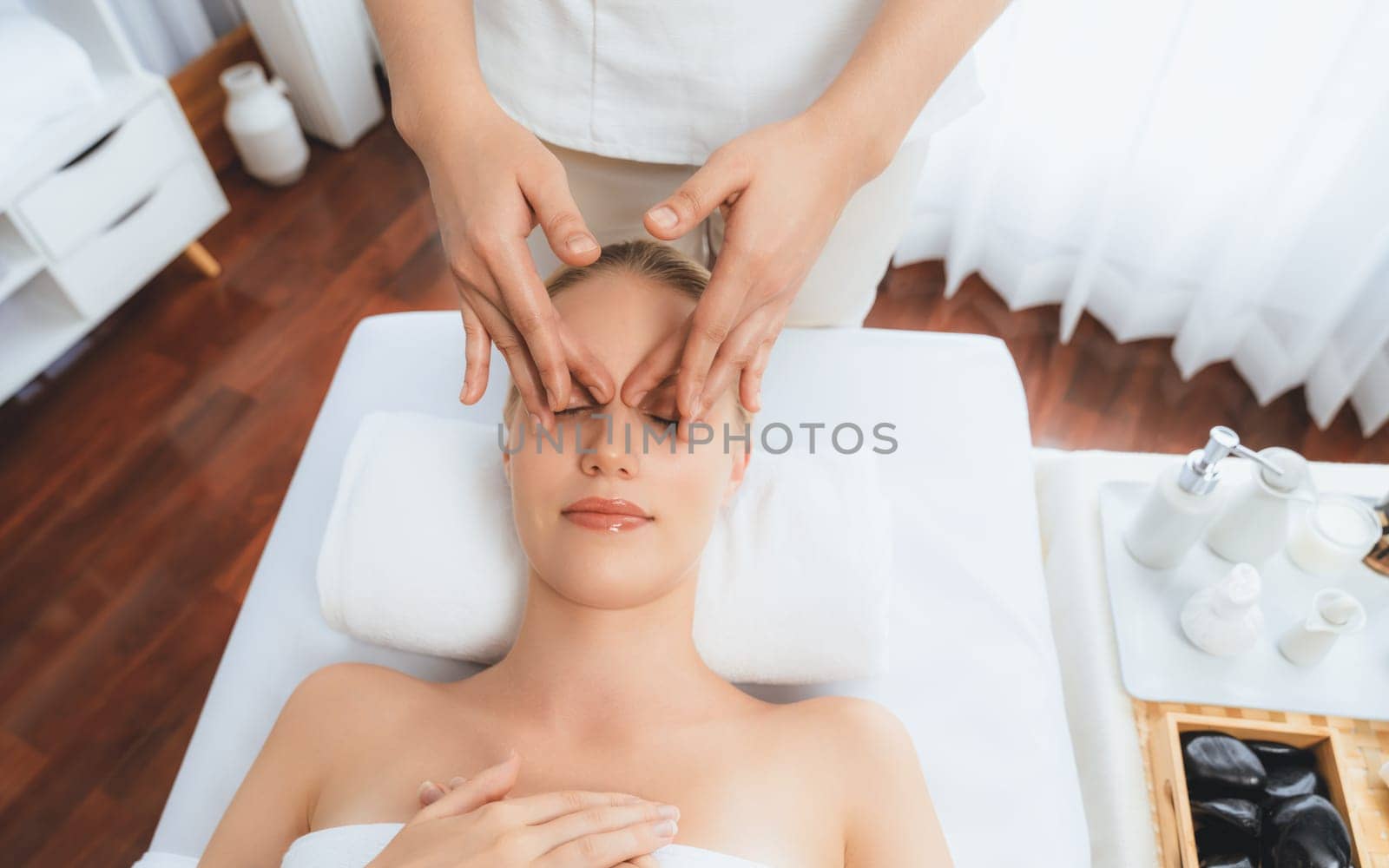 Panorama top view woman enjoying relaxing anti-stress head massage. Quiescent by biancoblue