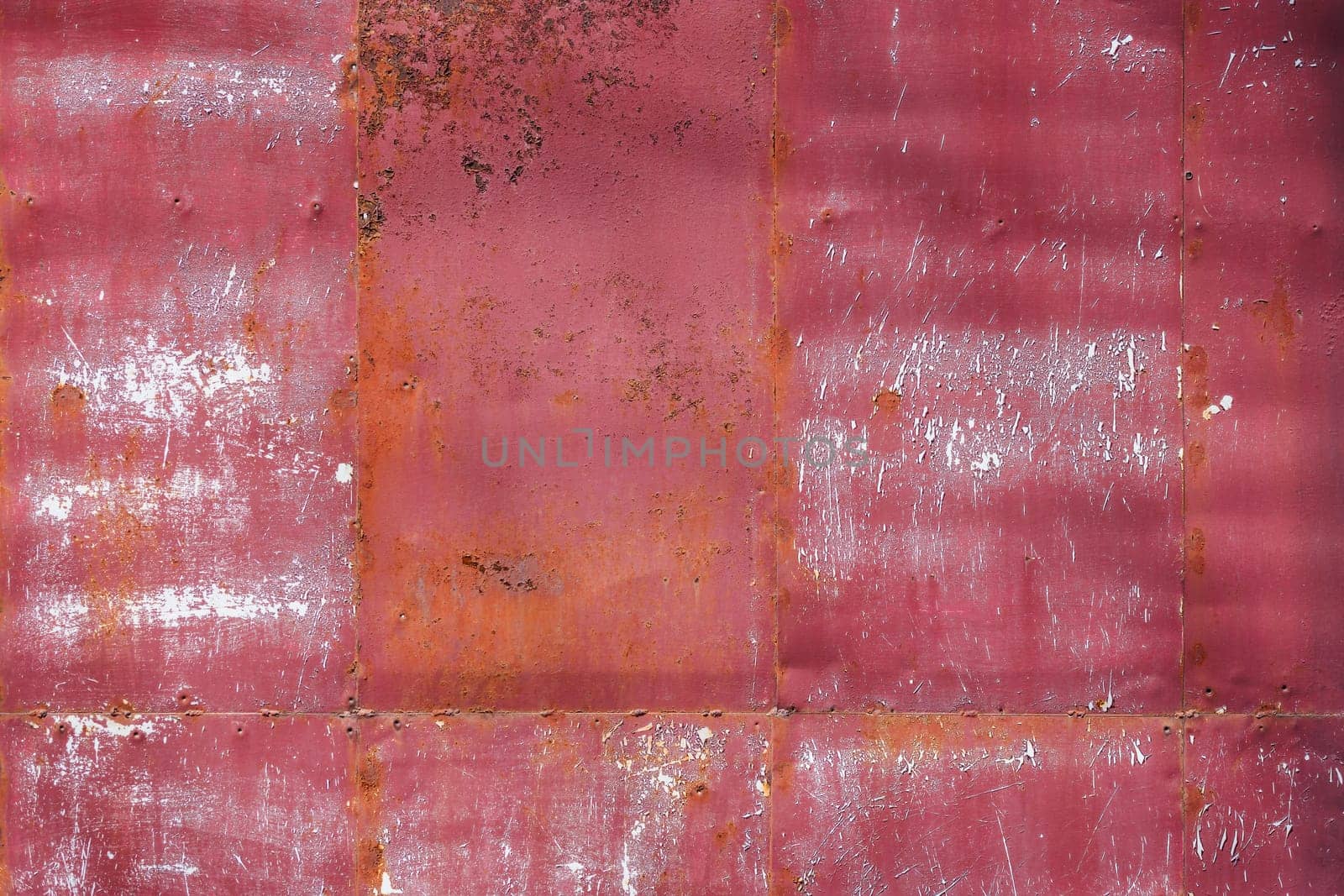 rusty red painted flat sheet metal surface full-frame background and texture.