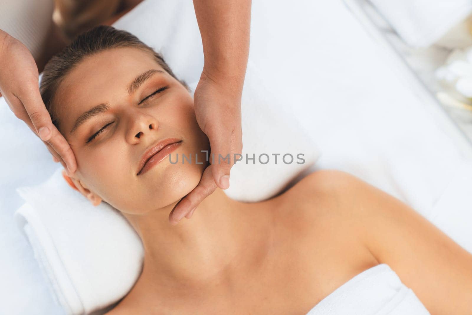 Panorama top view woman enjoying relaxing anti-stress head massage. Quiescent by biancoblue