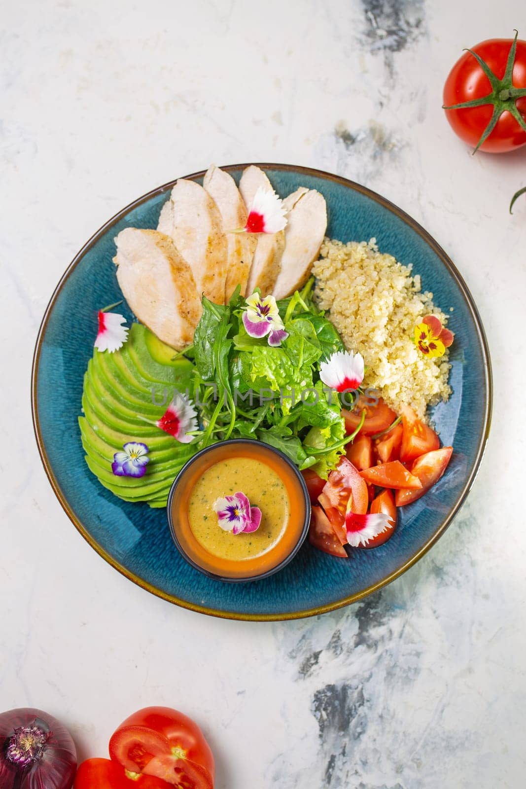 Healthy Lunch Plate With Grilled Chicken, Salad, Avocado, Couscous on Blue Plate by Pukhovskiy