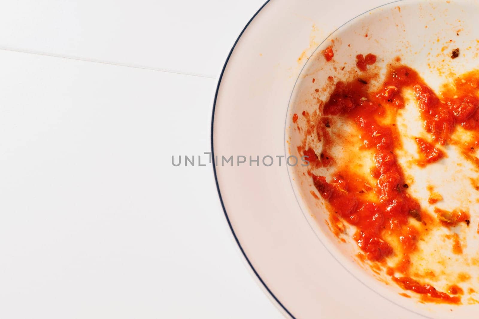 Empty dirty dish with sauce by victimewalker