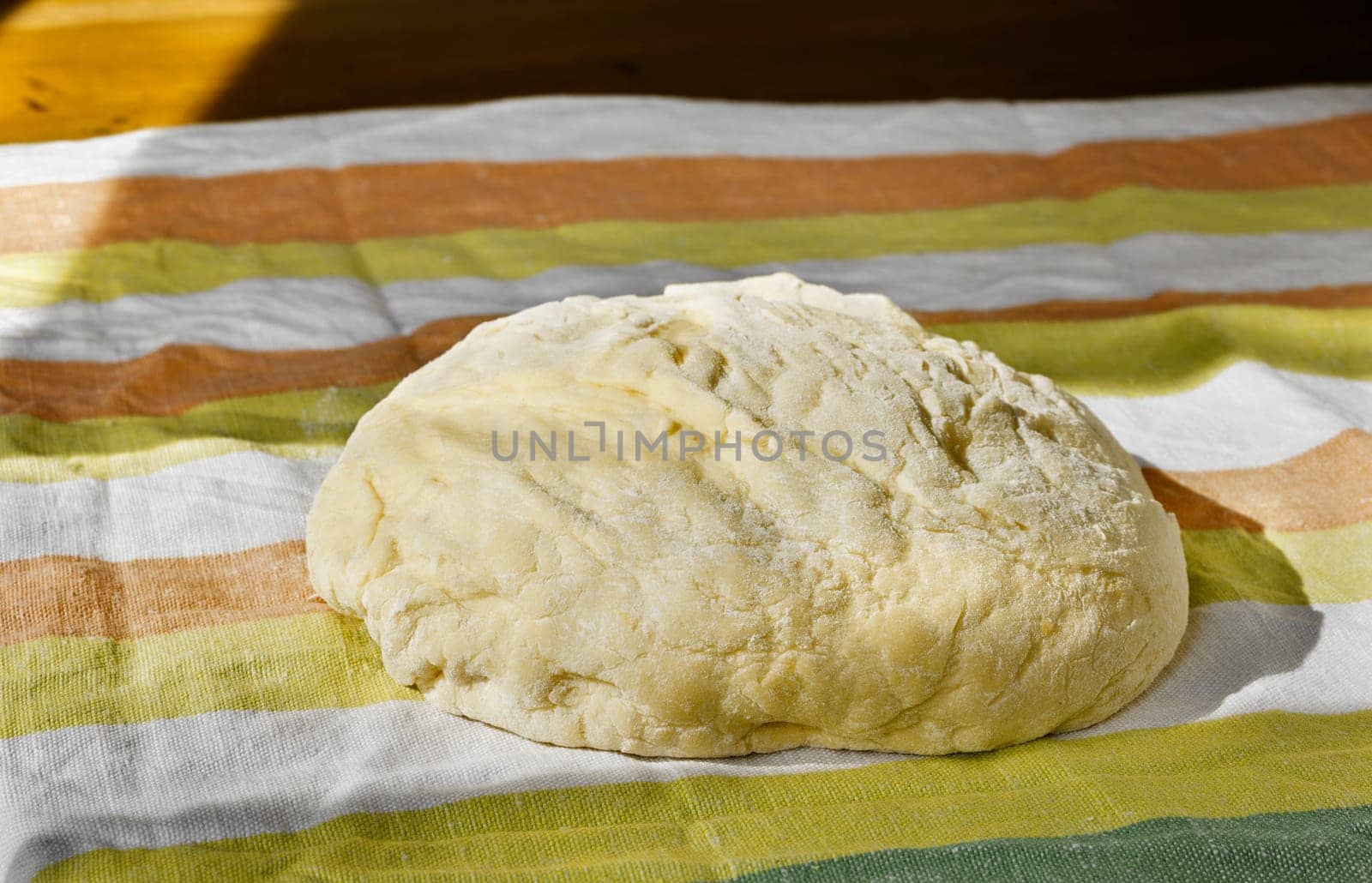 Raw dough on colored cloth ,baker occupation