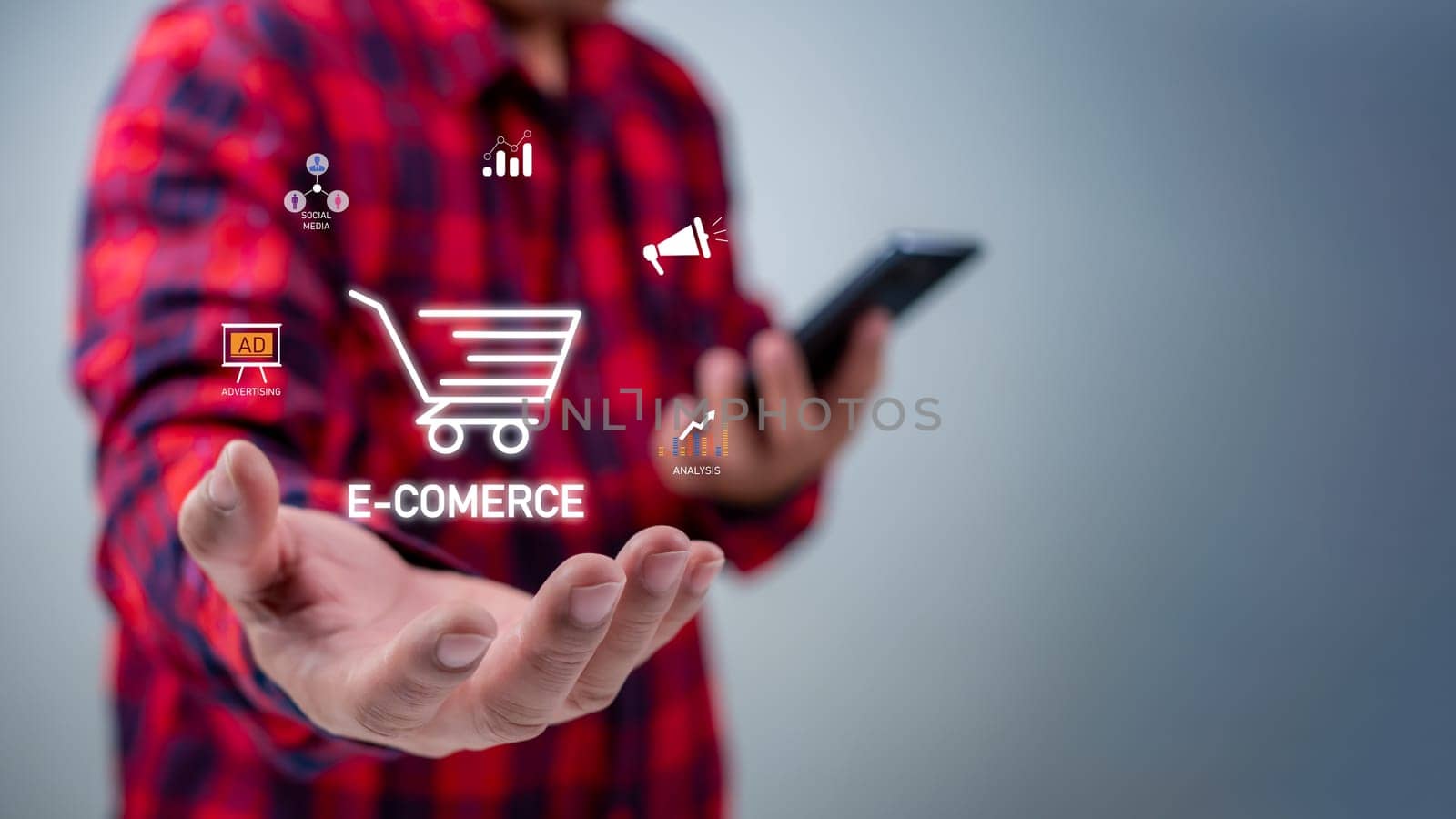 Businessman or customer hold smartphone with online shopping concept, marketplace website with virtual interface of online Shopping cart part of the e-commerce marketing network.