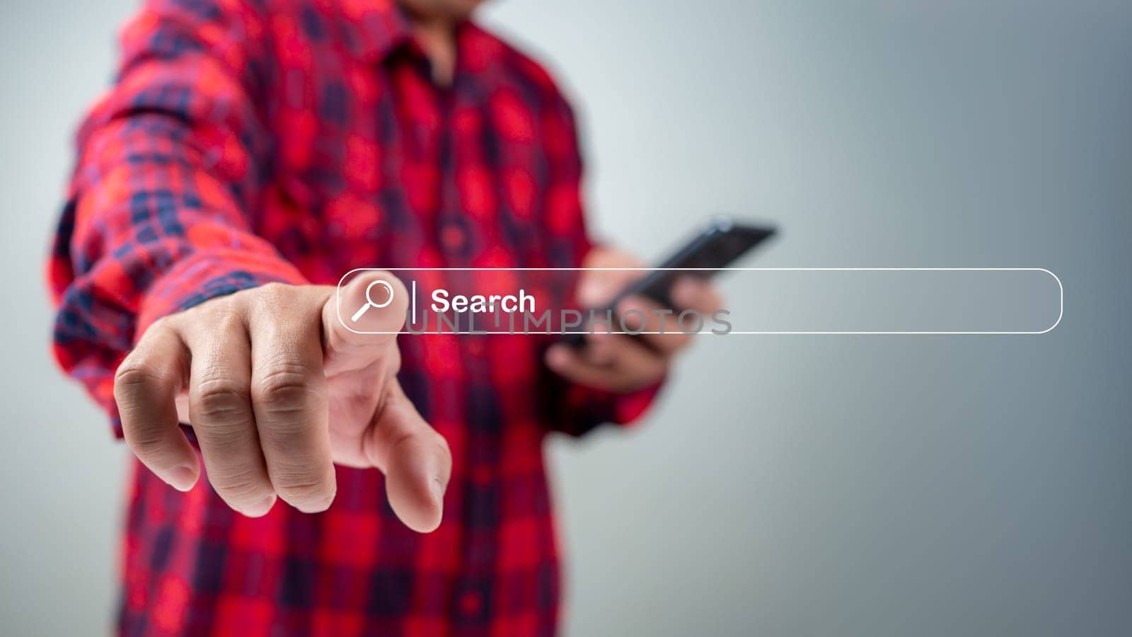 Man use cell phone to search data on internet finding information Website online, Search Engine Optimization, Searching information online, Concept of SEO, Search Engine Optimization. by Unimages2527
