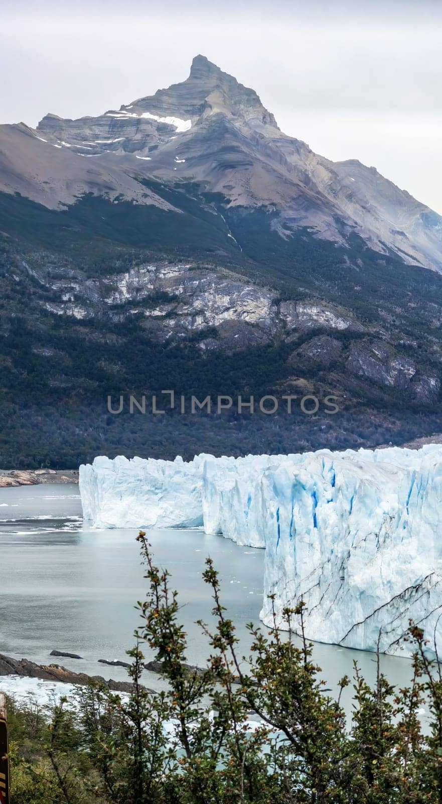 Majestic Iceberg Formation in Pristine Mountainous Landscape by FerradalFCG