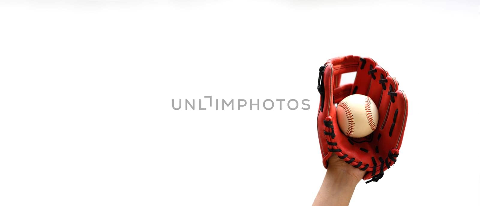 Hand with leather baseball glove and ball on white background. Fitness, sports and training concept.