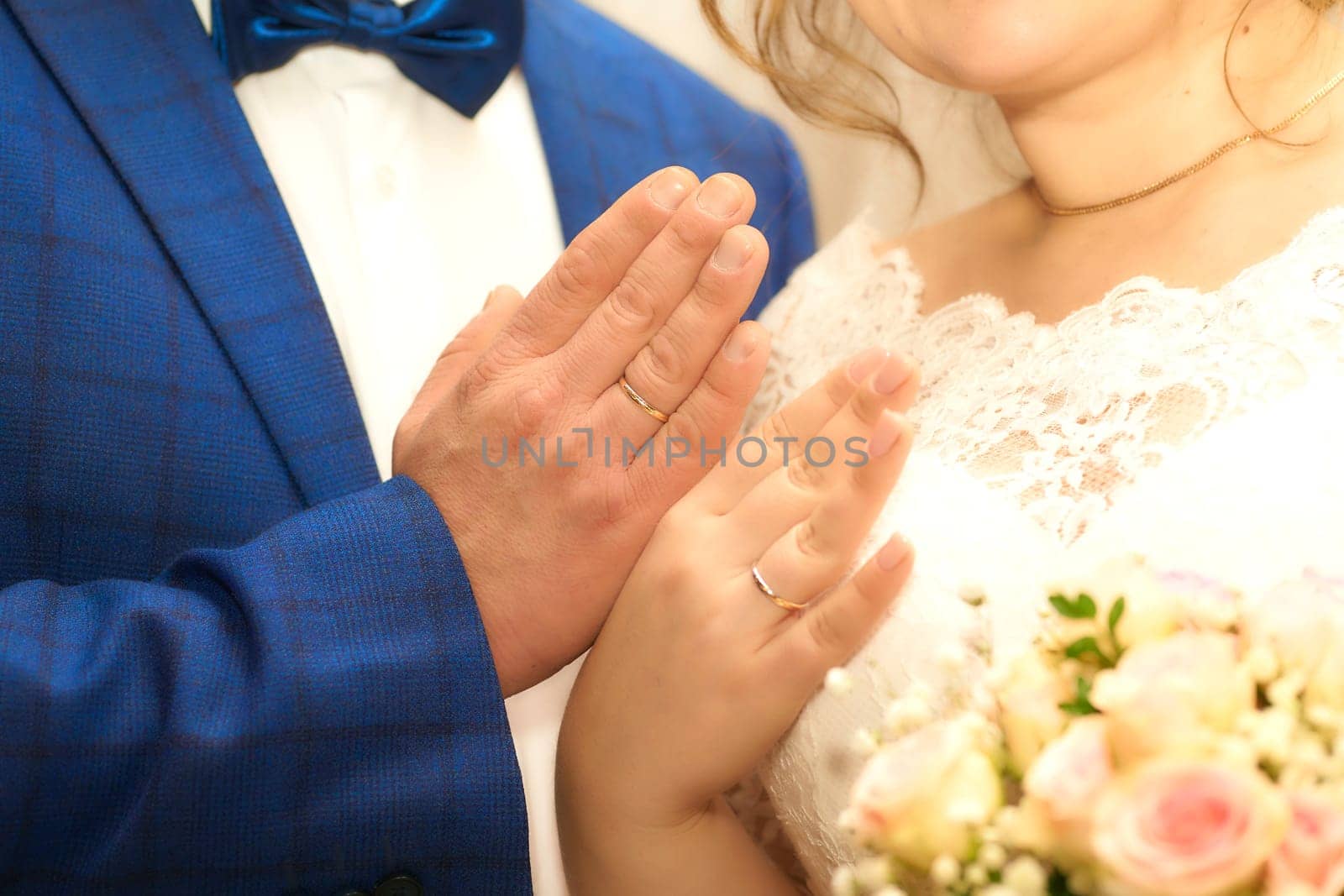 Hands of newlyweds with wedding rings, wedding, bride and groom by jovani68