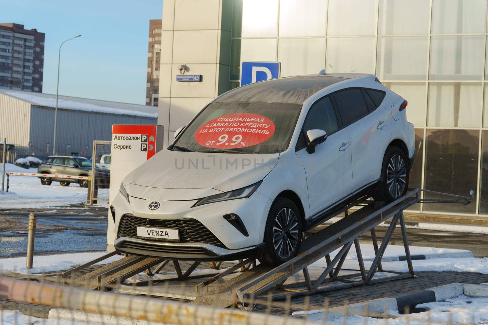 Tyumen, Russia-March 02, 2024: Displayed Toyota Venza on Showroom Ramp in Winter by darksoul72