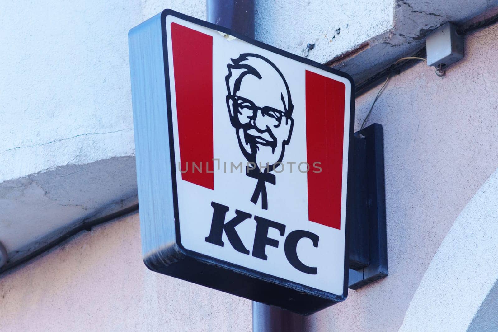 Tyumen, Russia-March 02, 2024: Captures the iconic KFC logo prominently displayed on a signboard by darksoul72