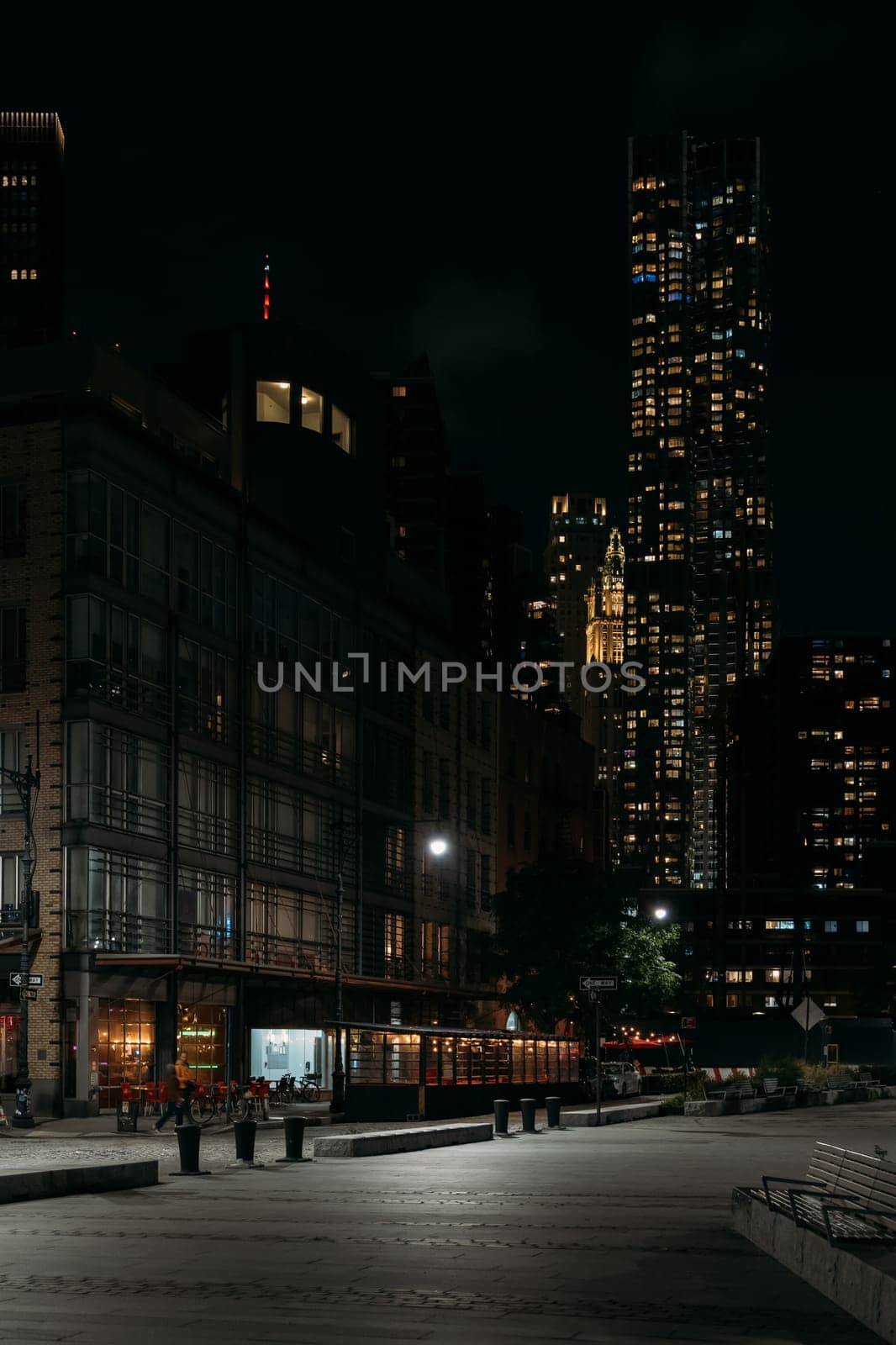 New York City Nightscape with Glowing Skyscrapers and Empty Streets by apavlin