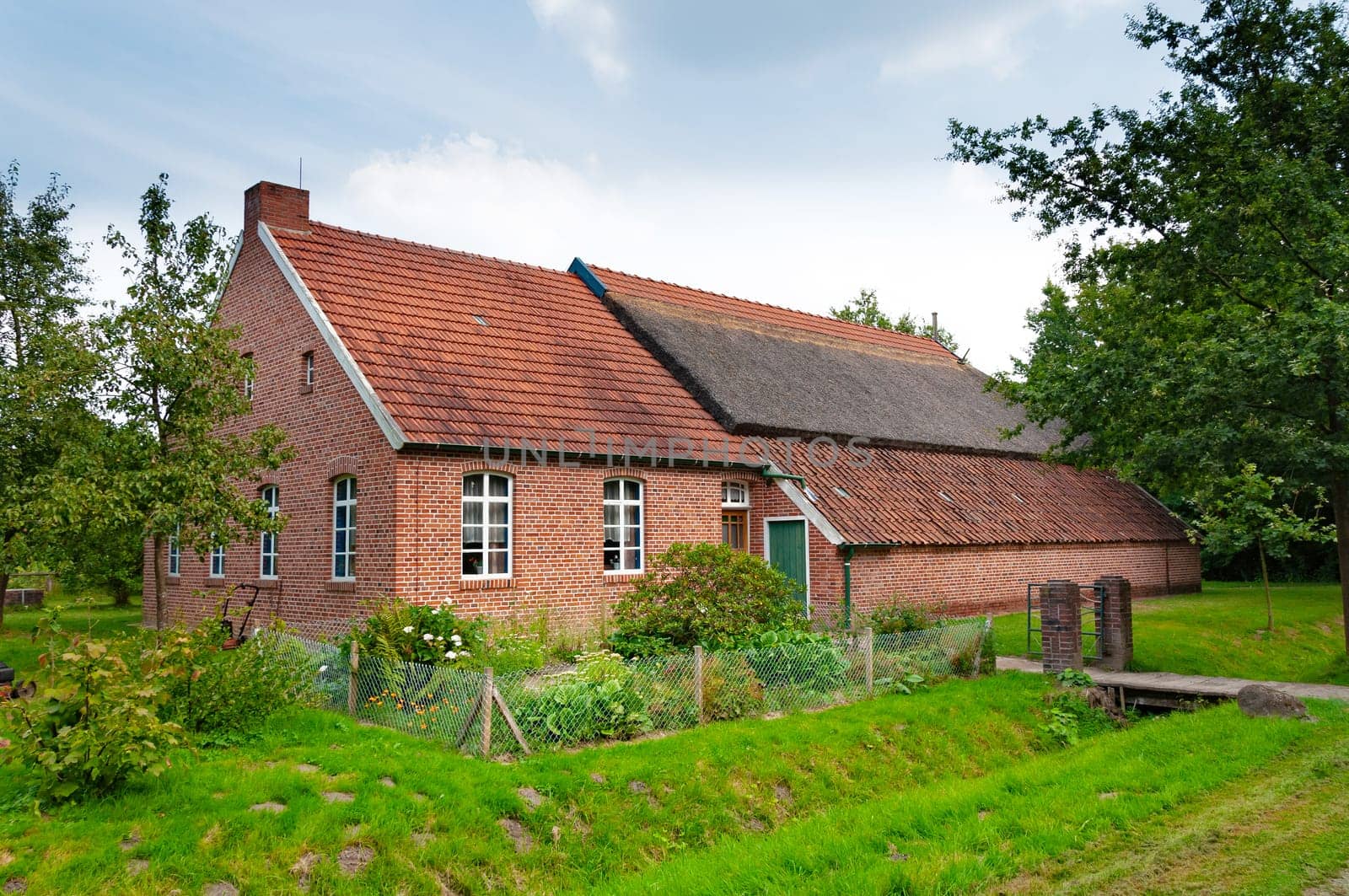 Cozy german house. Old german country red house.