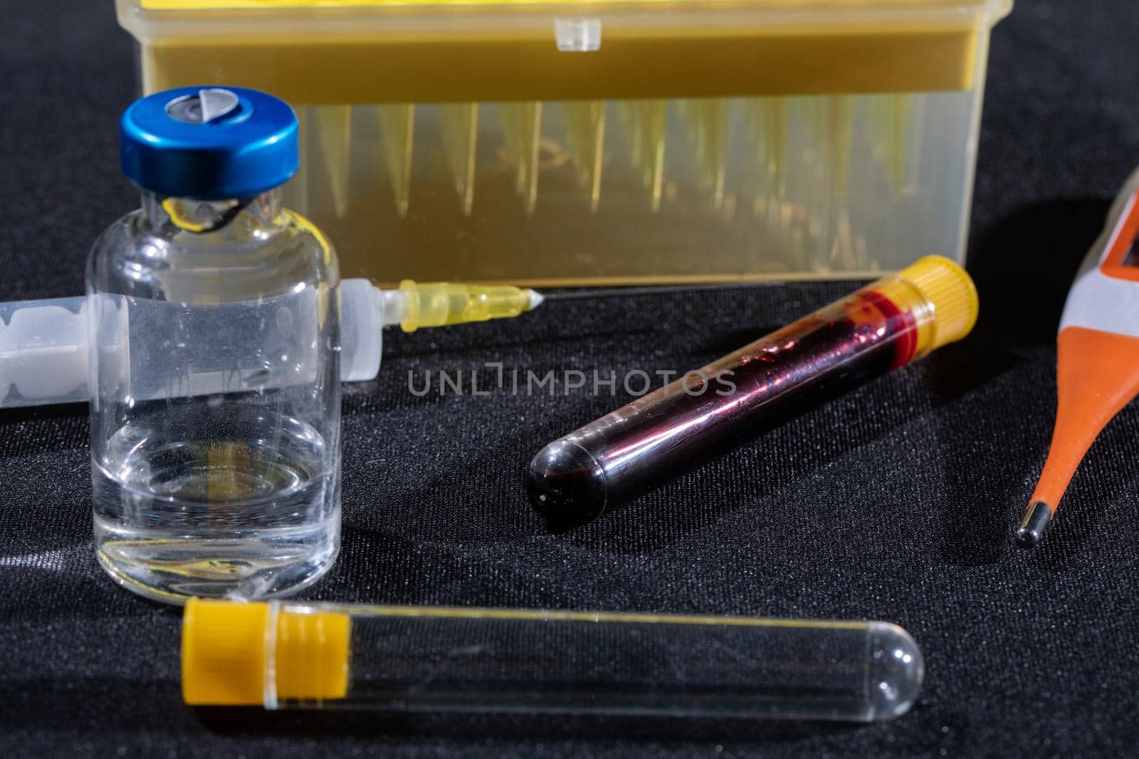Each blood vial is transported to the laboratory for specialized tests.